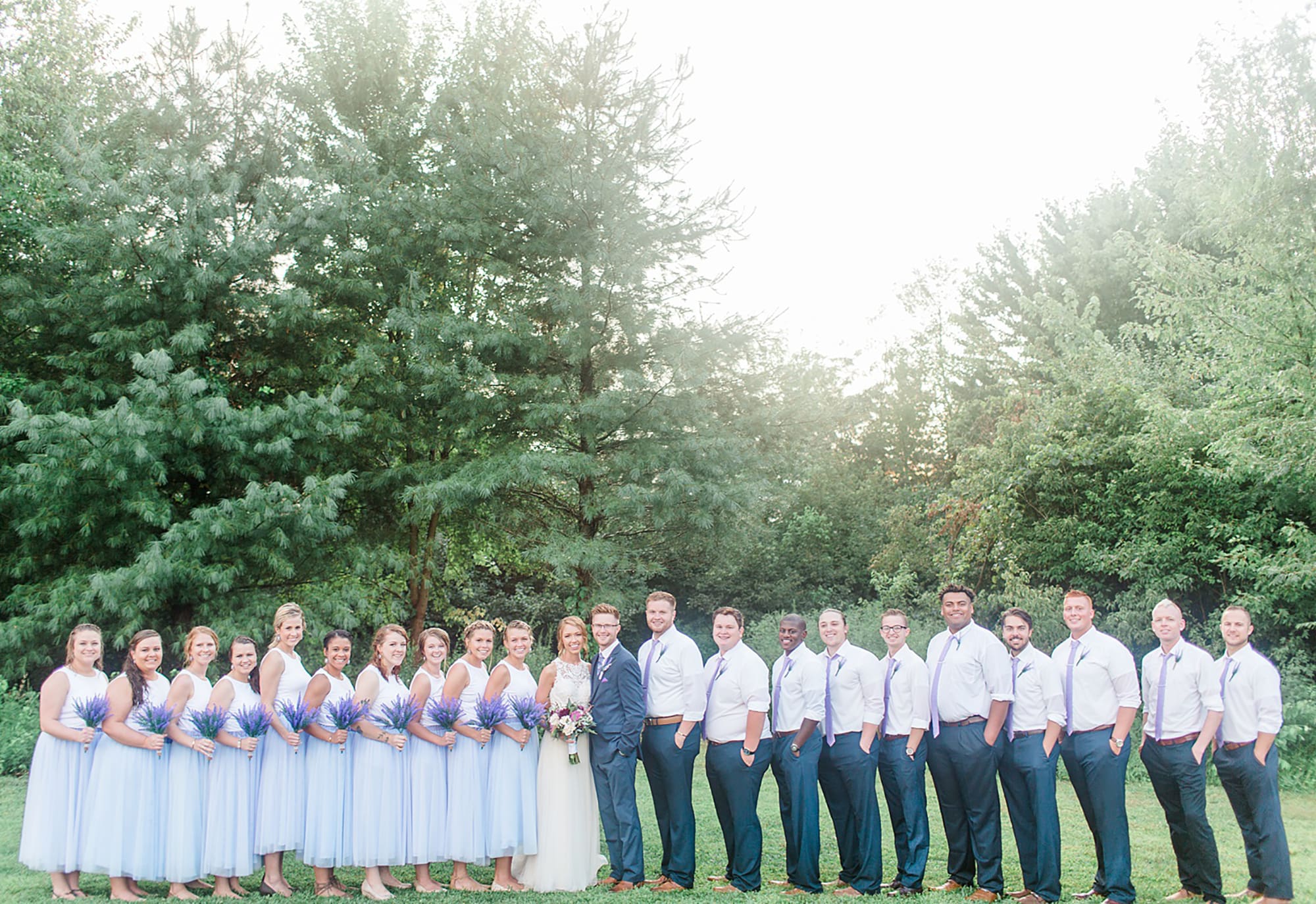 Arielle Peters Photography | Wedding party next to large trees at outdoor wedding at Willowfield Lavender Farm in Mooresville, Indiana. 