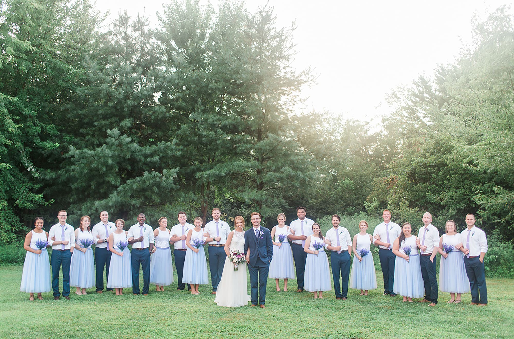 Arielle Peters Photography | Wedding party next to large trees at outdoor wedding at Willowfield Lavender Farm in Mooresville, Indiana. 
