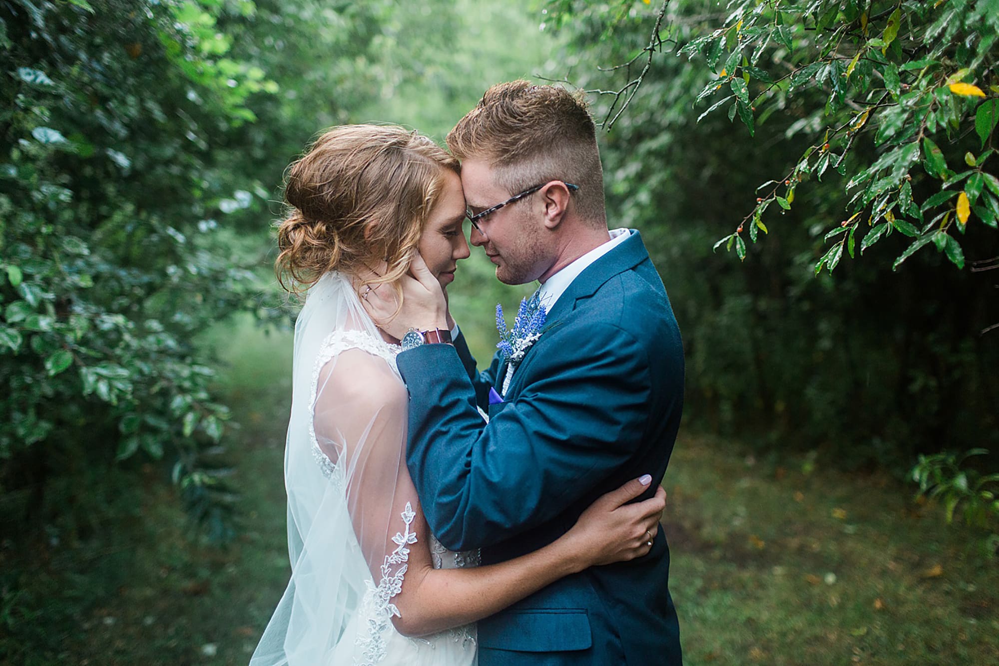 Arielle Peters Photography | Bride and groom under tunnel of trees at outdoor wedding at Willowfield Lavender Farm in Mooresville, Indiana. 