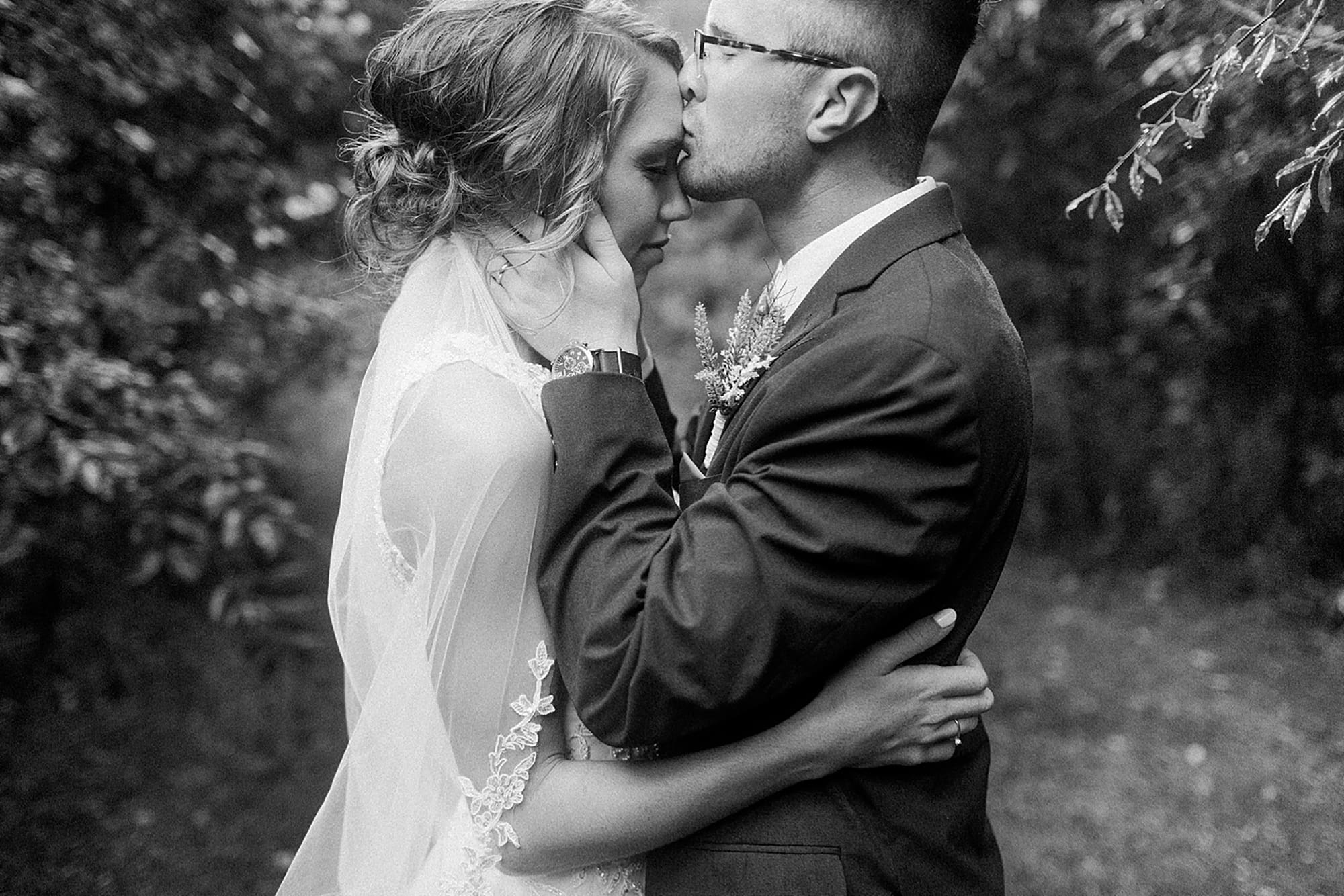 Arielle Peters Photography | Bride and groom under tunnel of trees at outdoor wedding at Willowfield Lavender Farm in Mooresville, Indiana. 