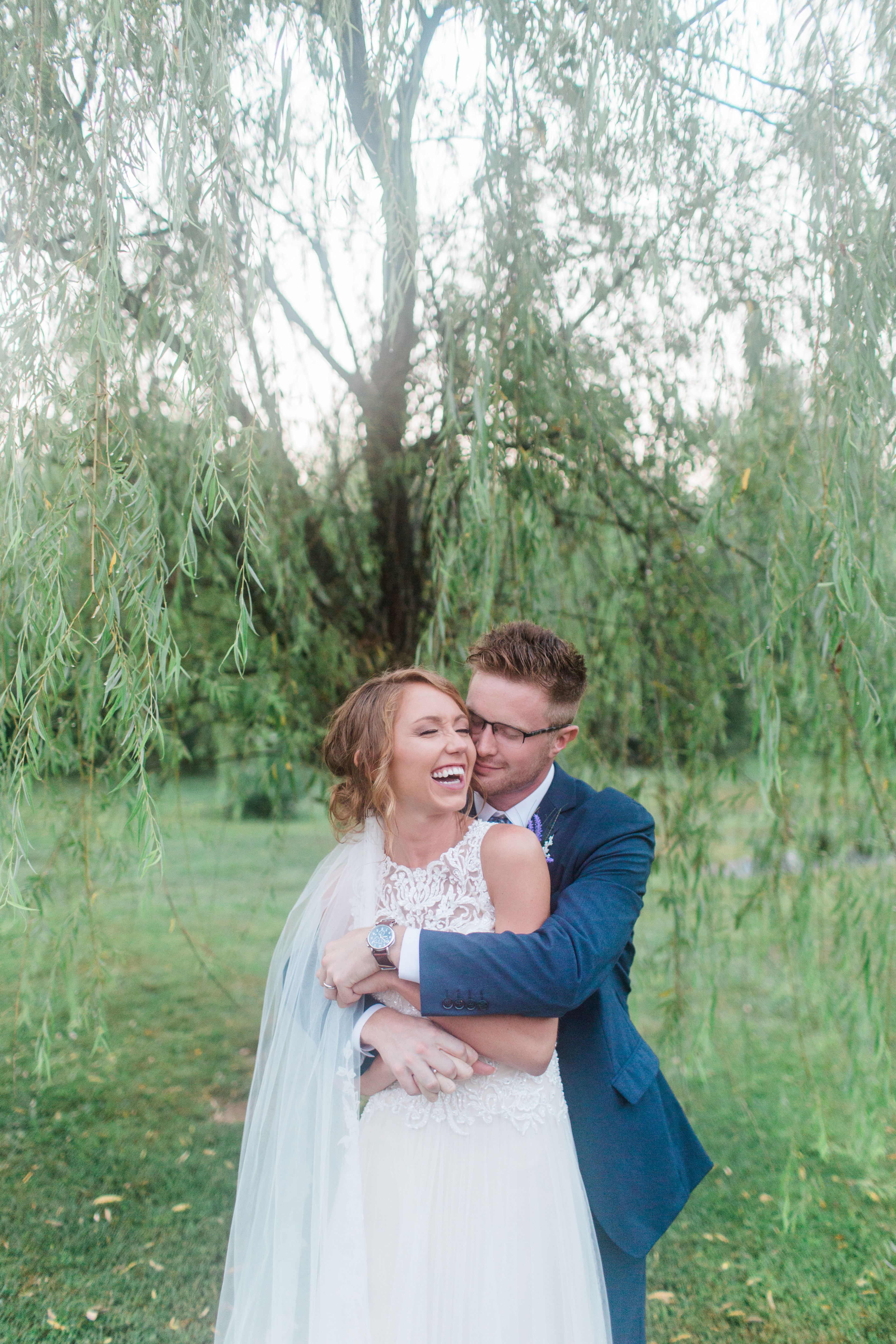 Arielle Peters Photography taking a couple’s wedding day photos at Willowfield Lavender Farm in Mooresville, Indiana.