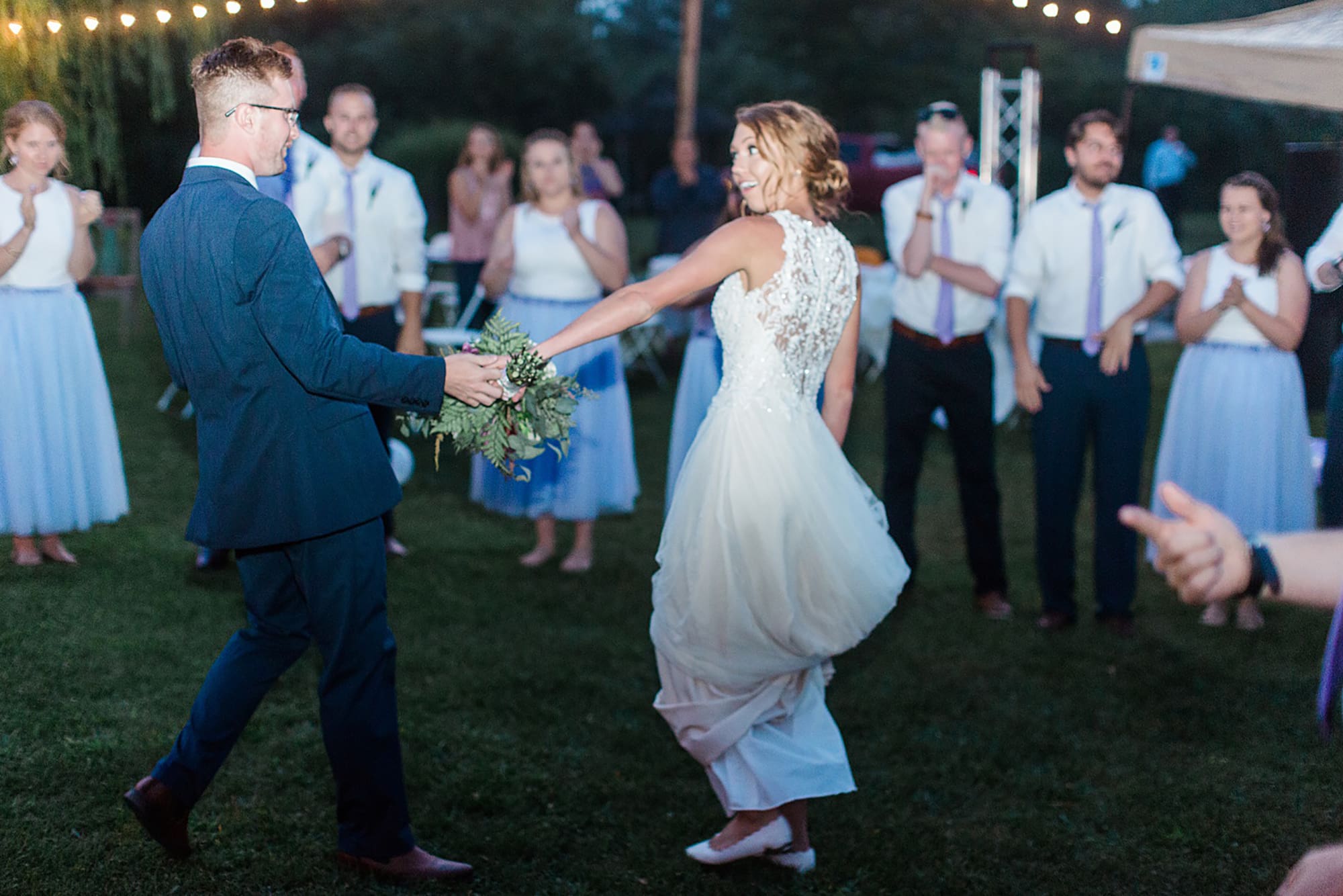 Arielle Peters Photography | Bride and groom dancing at outdoor wedding reception on wedding day at Willowfield Lavender Farm in Mooresville, Indiana. 