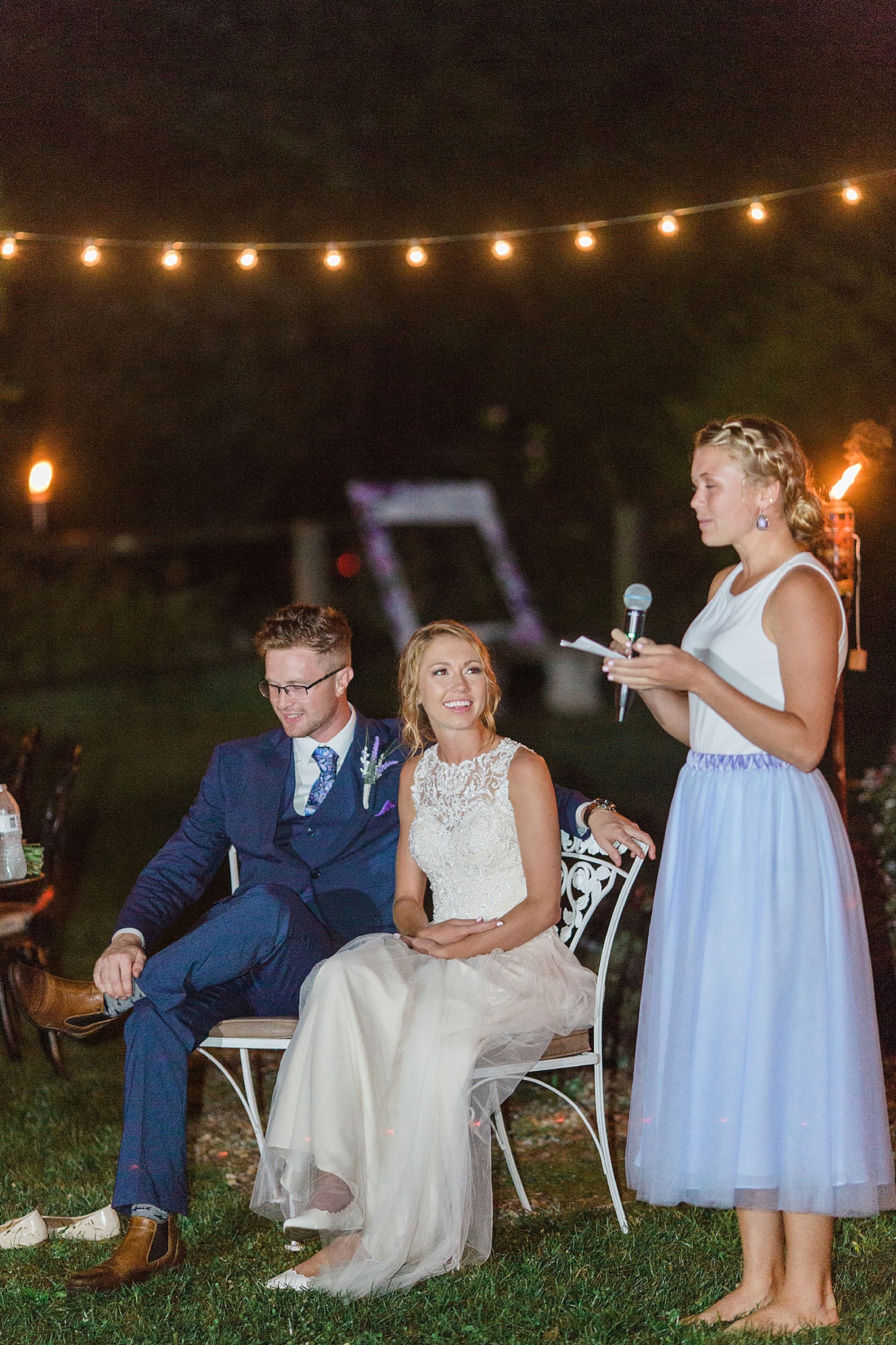 Arielle Peters Photography | Bride and groom laughing at outdoor wedding reception on wedding day at Willowfield Lavender Farm in Mooresville, Indiana. 