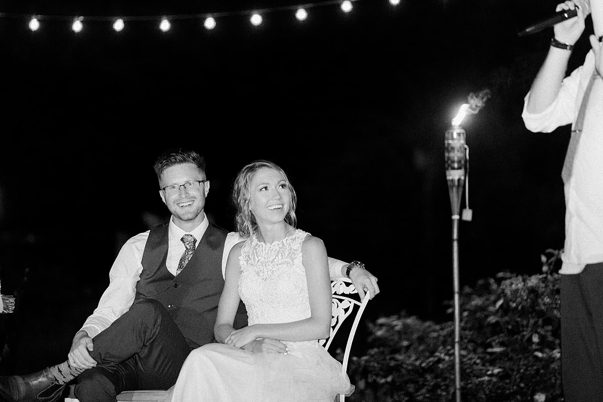 Arielle Peters Photography | Bride and groom laughing at outdoor wedding reception on wedding day at Willowfield Lavender Farm in Mooresville, Indiana. 