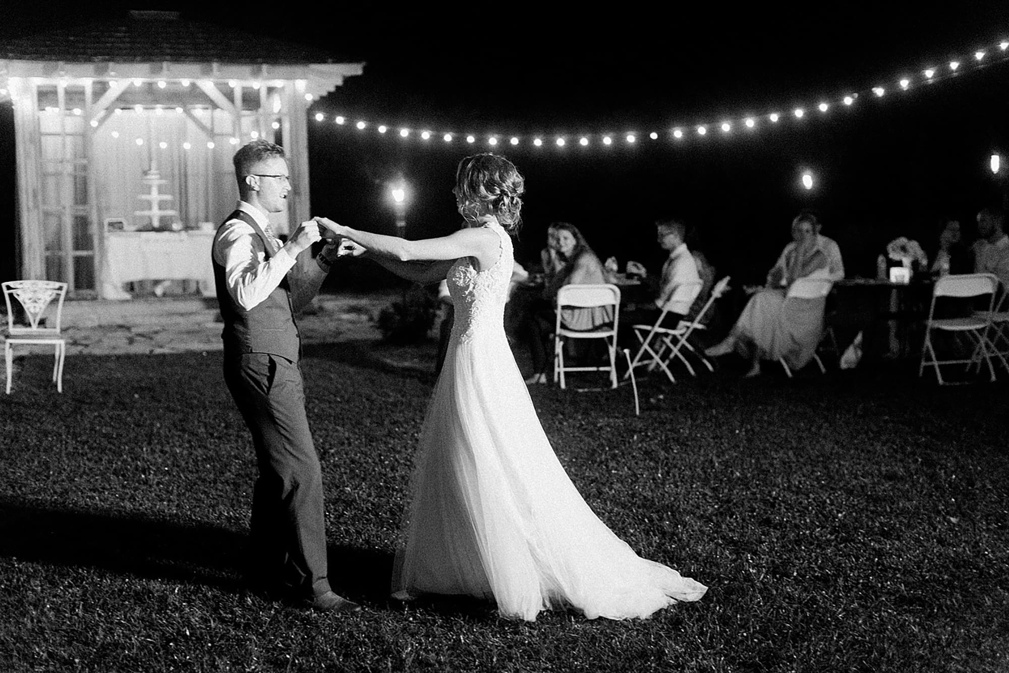 Arielle Peters Photography | Bride and groom sharing first dance at wedding reception on wedding day at Willowfield Lavender Farm in Mooresville, Indiana. 