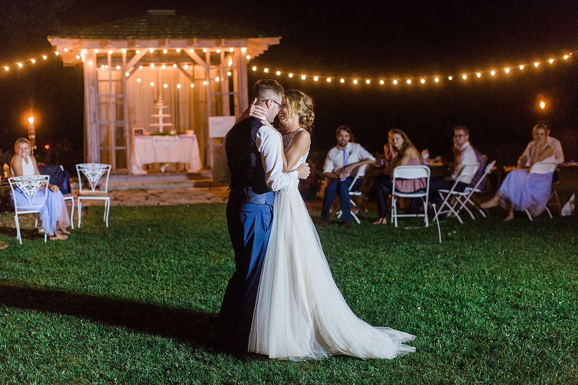 Arielle Peters Photography | Bride and groom sharing first dance at wedding reception on wedding day at Willowfield Lavender Farm in Mooresville, Indiana. 