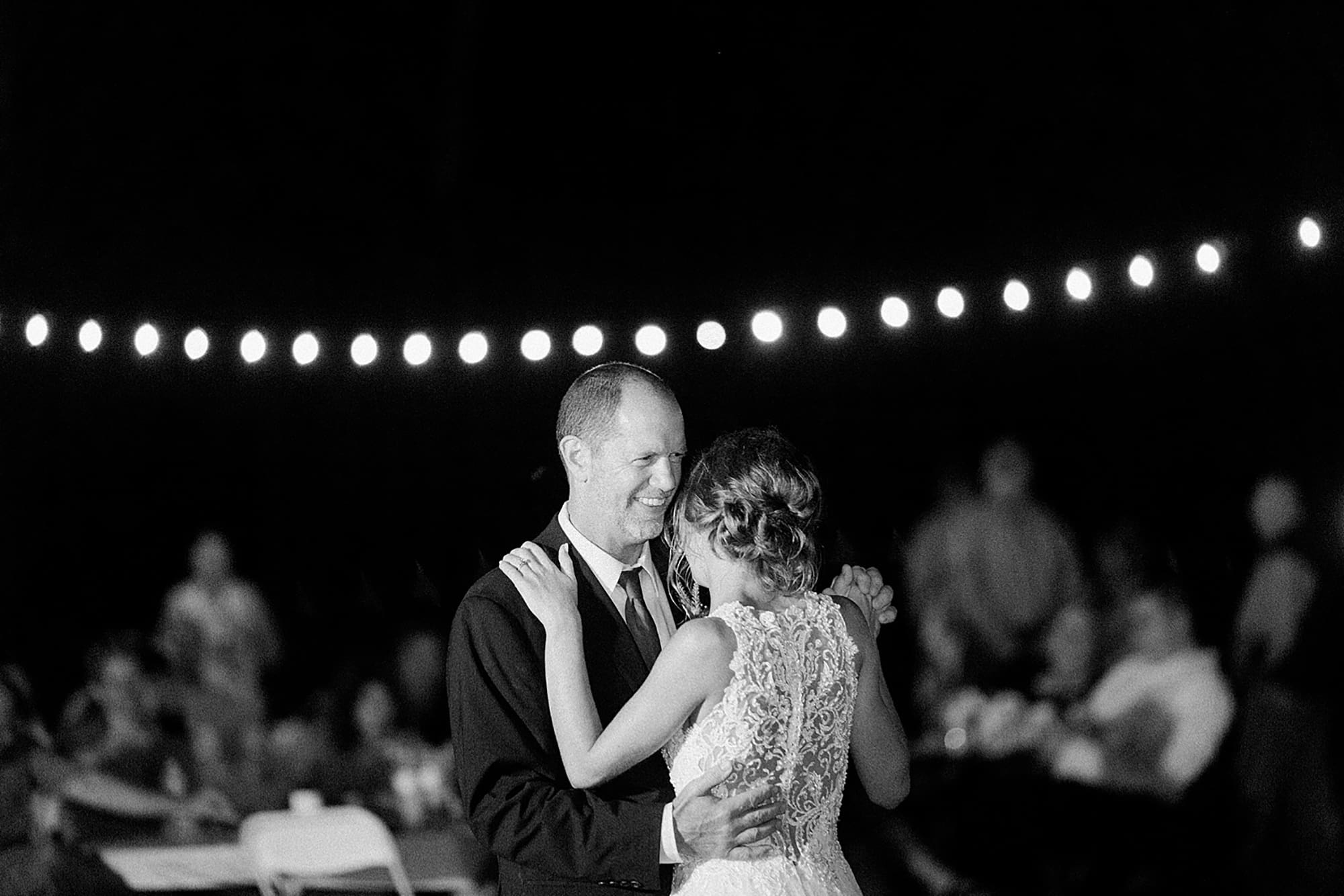 Arielle Peters Photography | Father of bride and bride sharing a dance at wedding reception on wedding day at Willowfield Lavender Farm in Mooresville, Indiana. 
