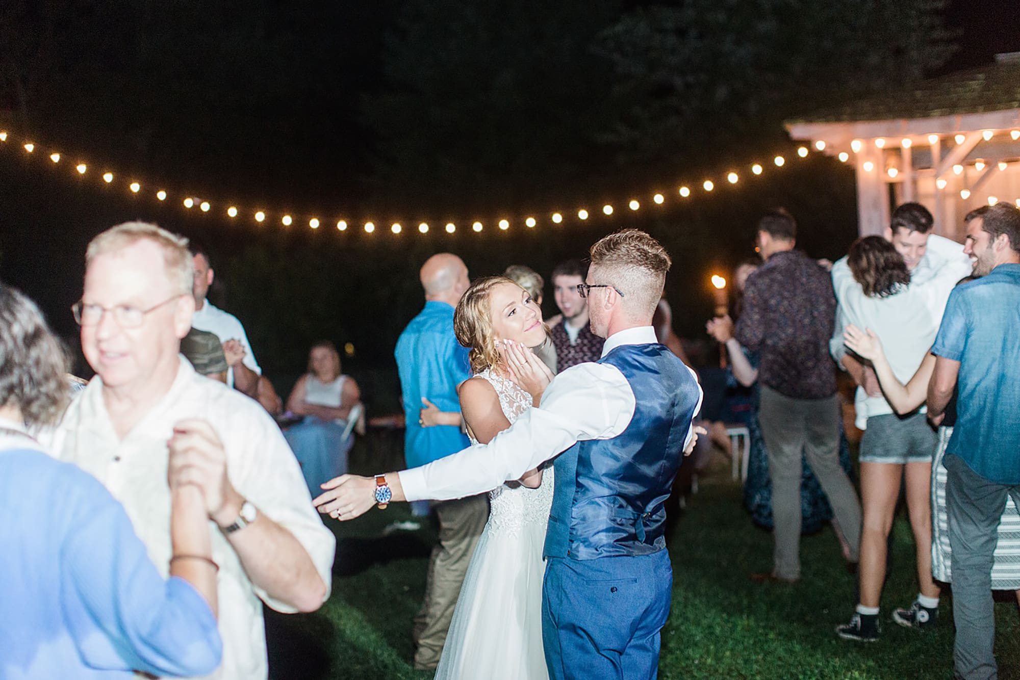 Arielle Peters Photography | Bride and groom dancing at outdoor wedding reception on wedding day at Willowfield Lavender Farm in Mooresville, Indiana. 