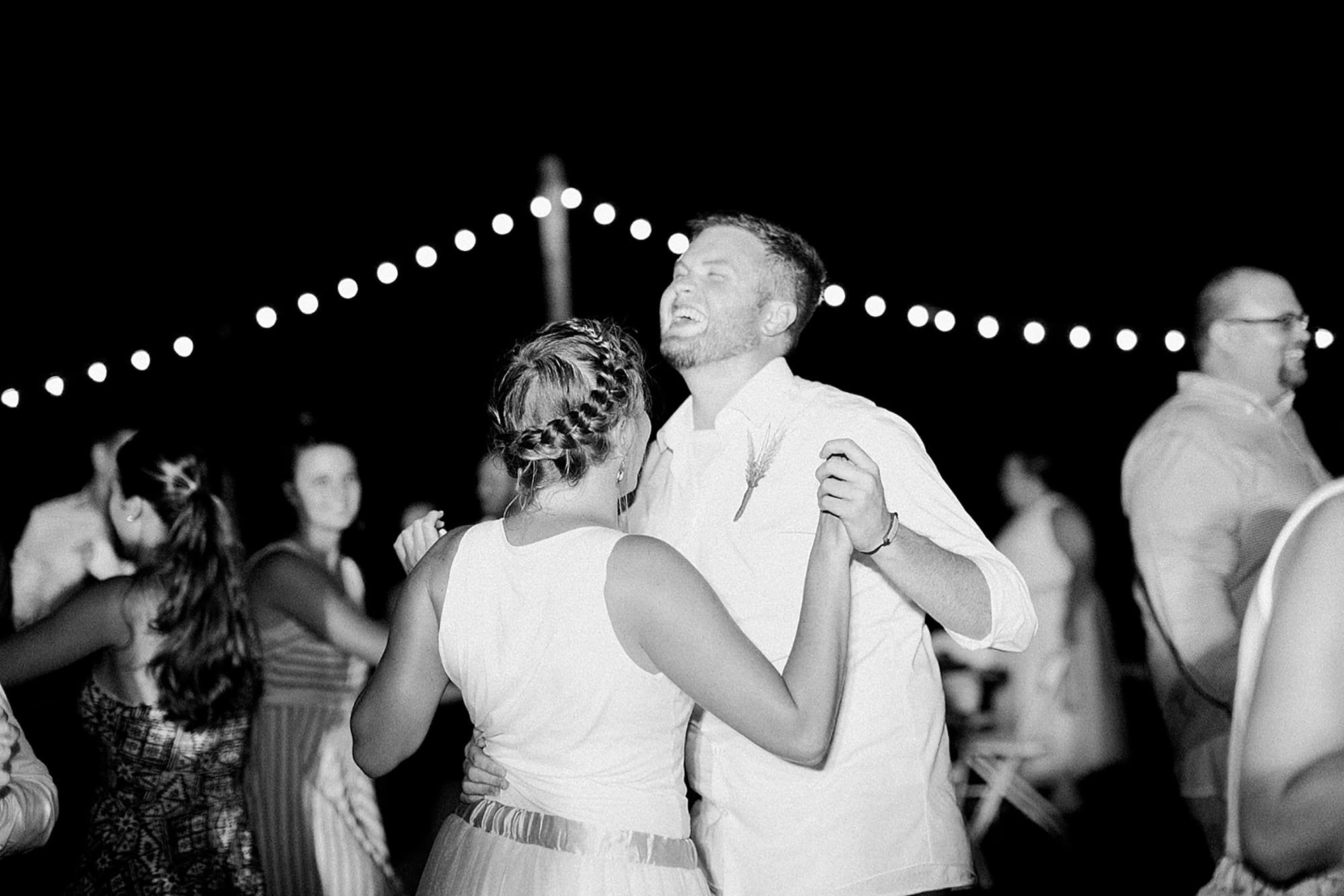 Arielle Peters Photography | Guests dancing at outdoor wedding reception on wedding day at Willowfield Lavender Farm in Mooresville, Indiana. 