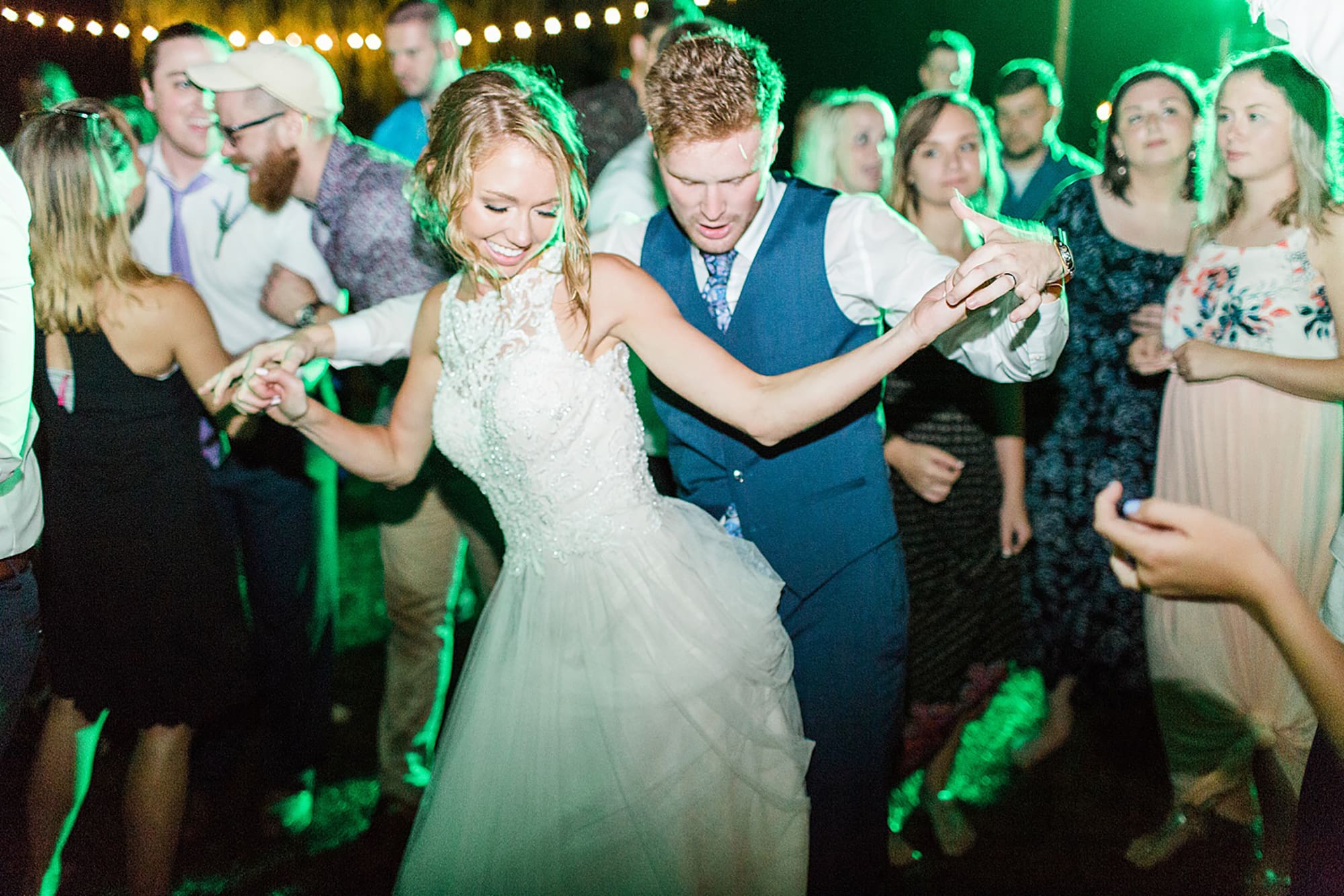 Arielle Peters Photography | Bride and groom dancing at outdoor wedding reception on wedding day at Willowfield Lavender Farm in Mooresville, Indiana. 