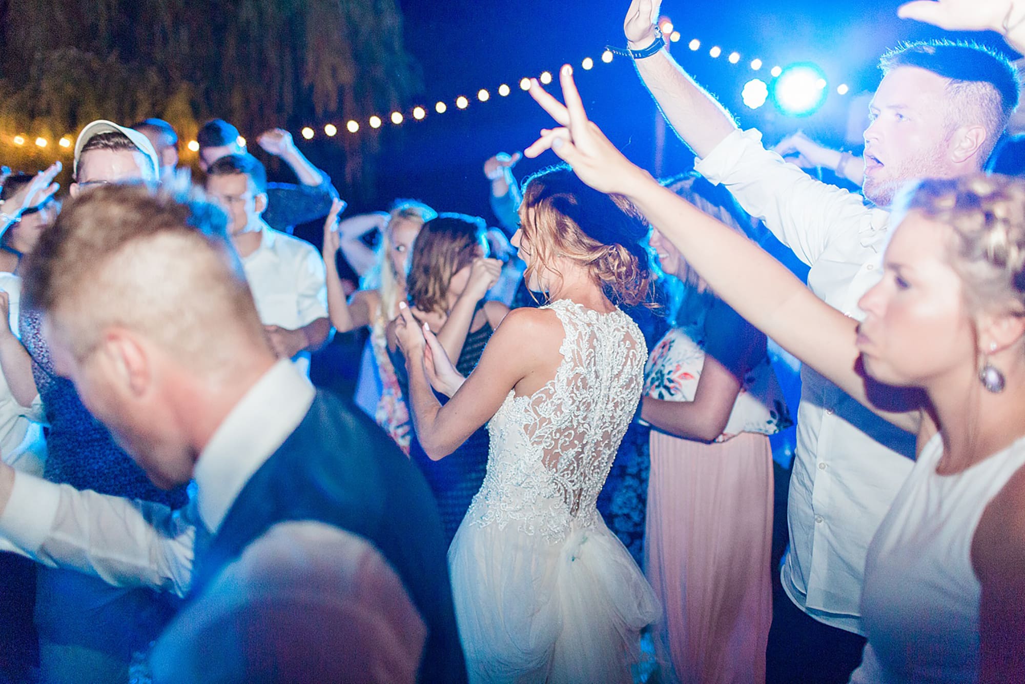 Arielle Peters Photography | Guests dancing at outdoor wedding reception on wedding day at Willowfield Lavender Farm in Mooresville, Indiana. 