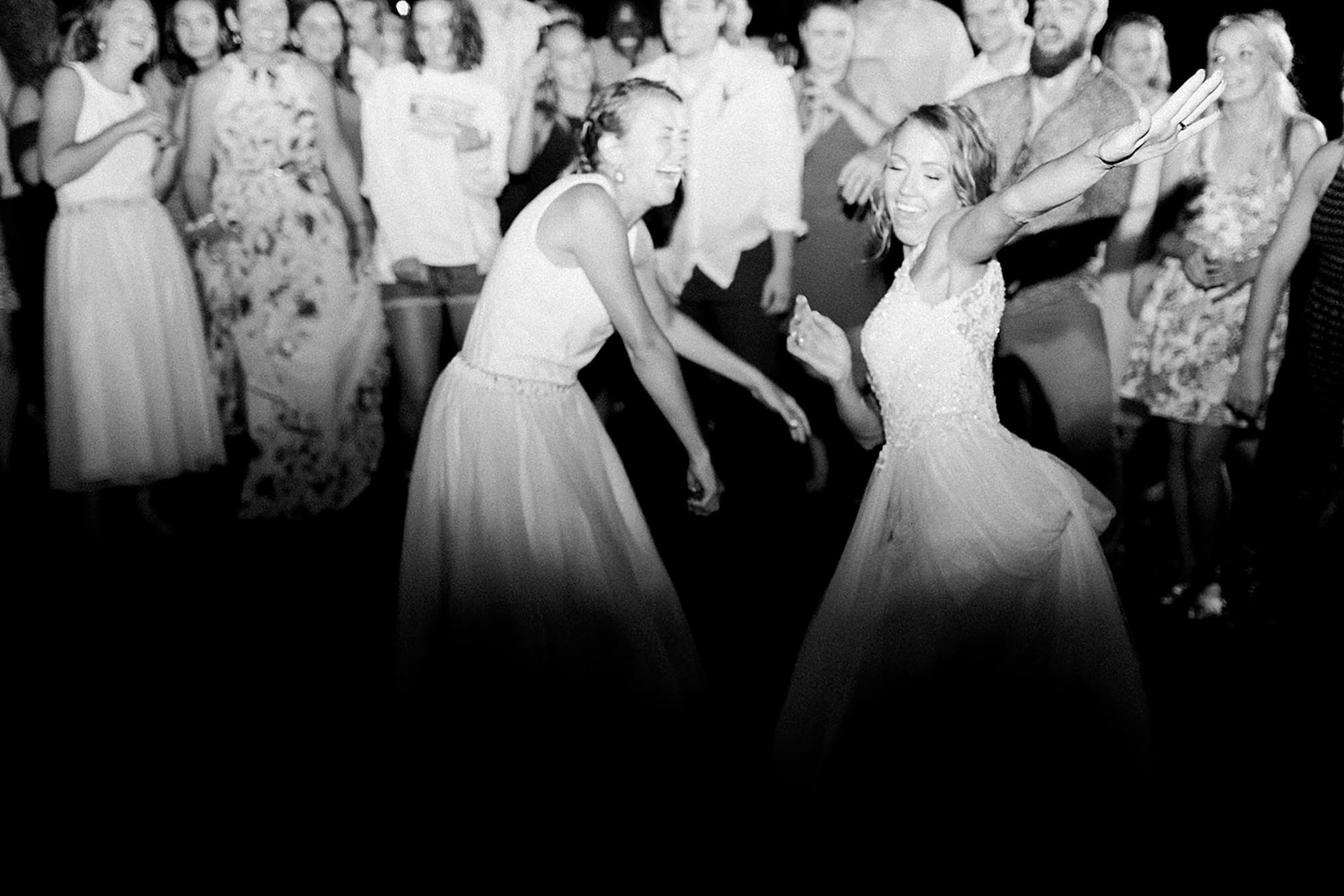 Arielle Peters Photography | Guests dancing at outdoor wedding reception on wedding day at Willowfield Lavender Farm in Mooresville, Indiana. 