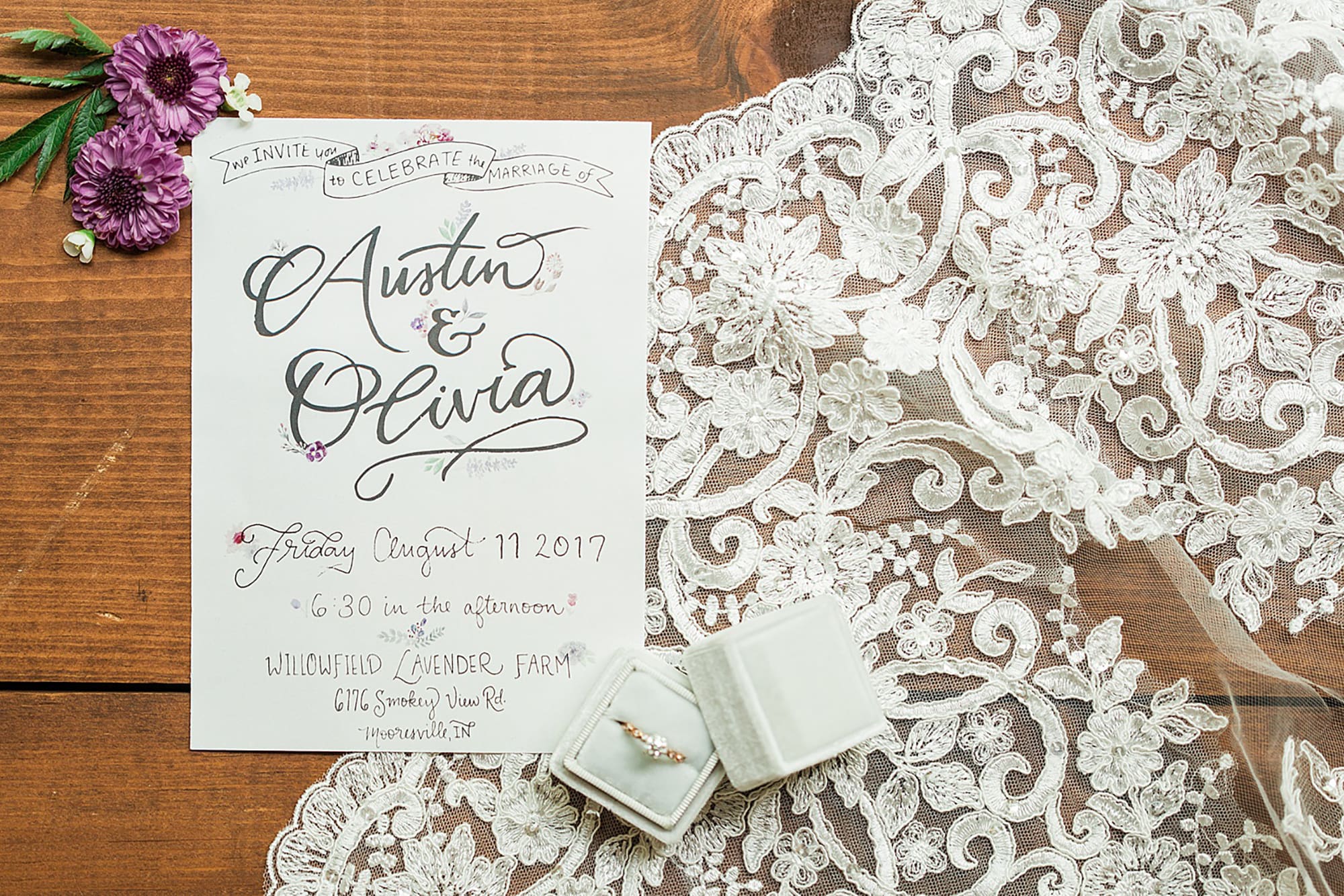 Arielle Peters Photography | Wedding invitation and ring on lace background on wedding day at Willowfield Lavender Farm in Mooresville, Indiana. 