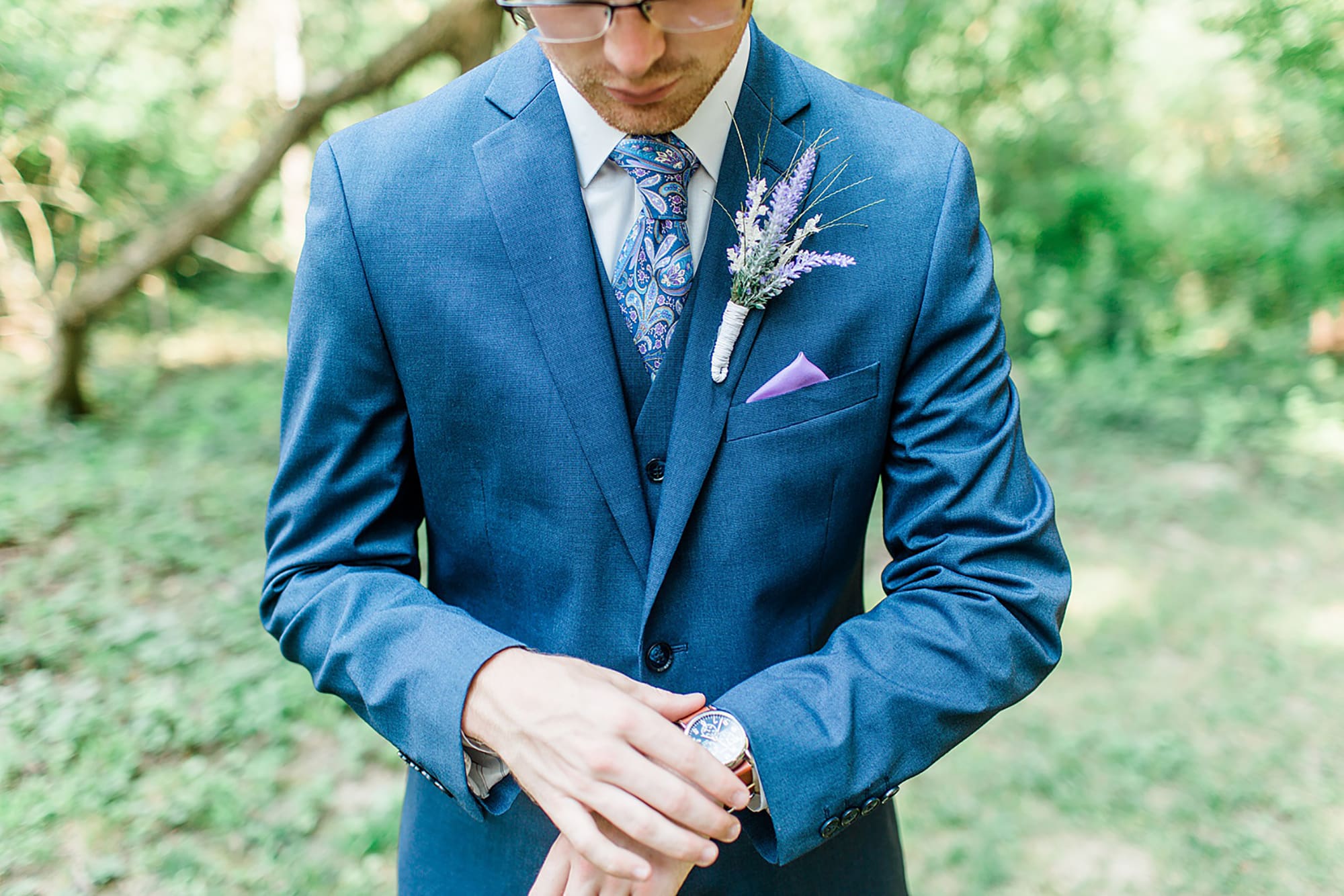 Arielle Peters Photography | Groom adjusting his watch on wedding day at Willowfield Lavender Farm in Mooresville, Indiana. 