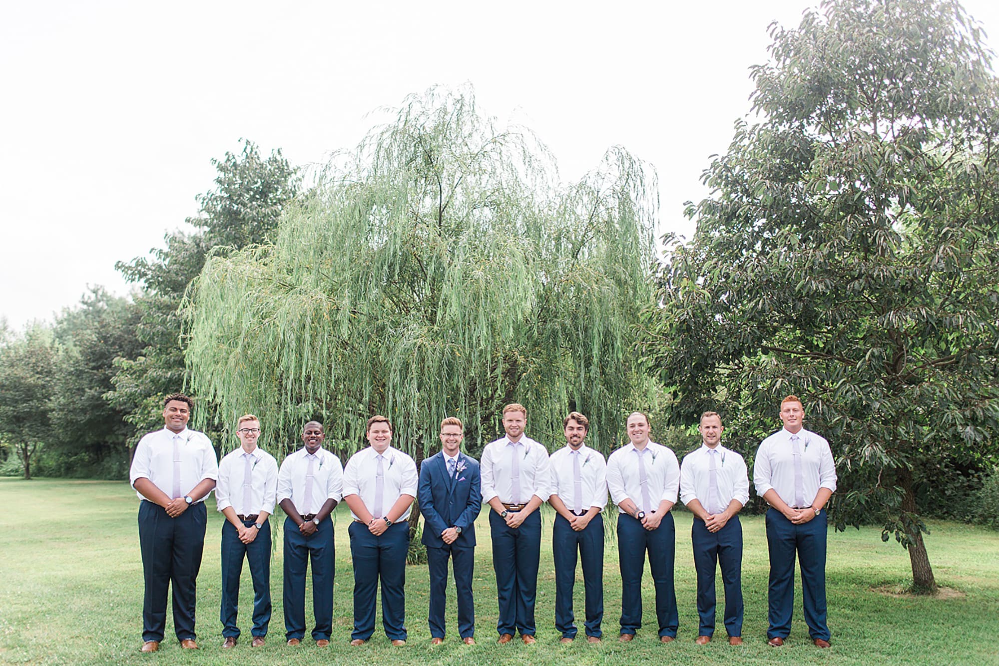 Arielle Peters Photography | Groom and groomsmen next to willow tree on wedding day at Willowfield Lavender Farm in Mooresville, Indiana. 