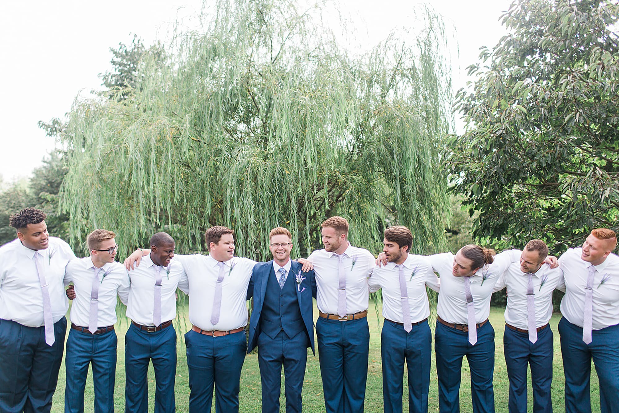 Arielle Peters Photography | Groom and groomsmen under willow tree on wedding day at Willowfield Lavender Farm in Mooresville, Indiana. 