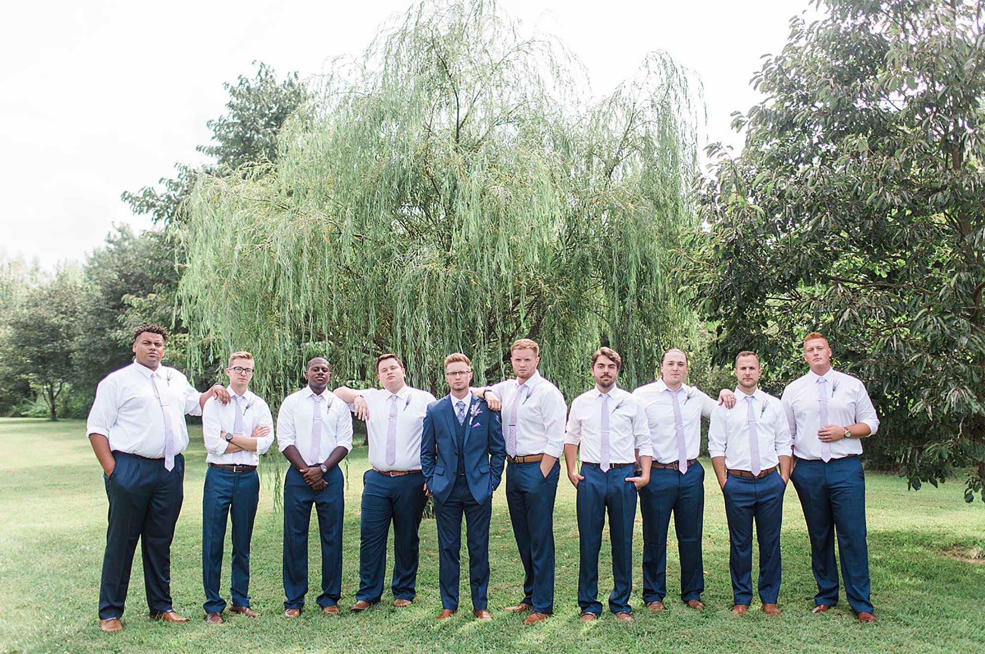 Arielle Peters Photography | Groom and groomsmen under willow tree on wedding day at Willowfield Lavender Farm in Mooresville, Indiana. 