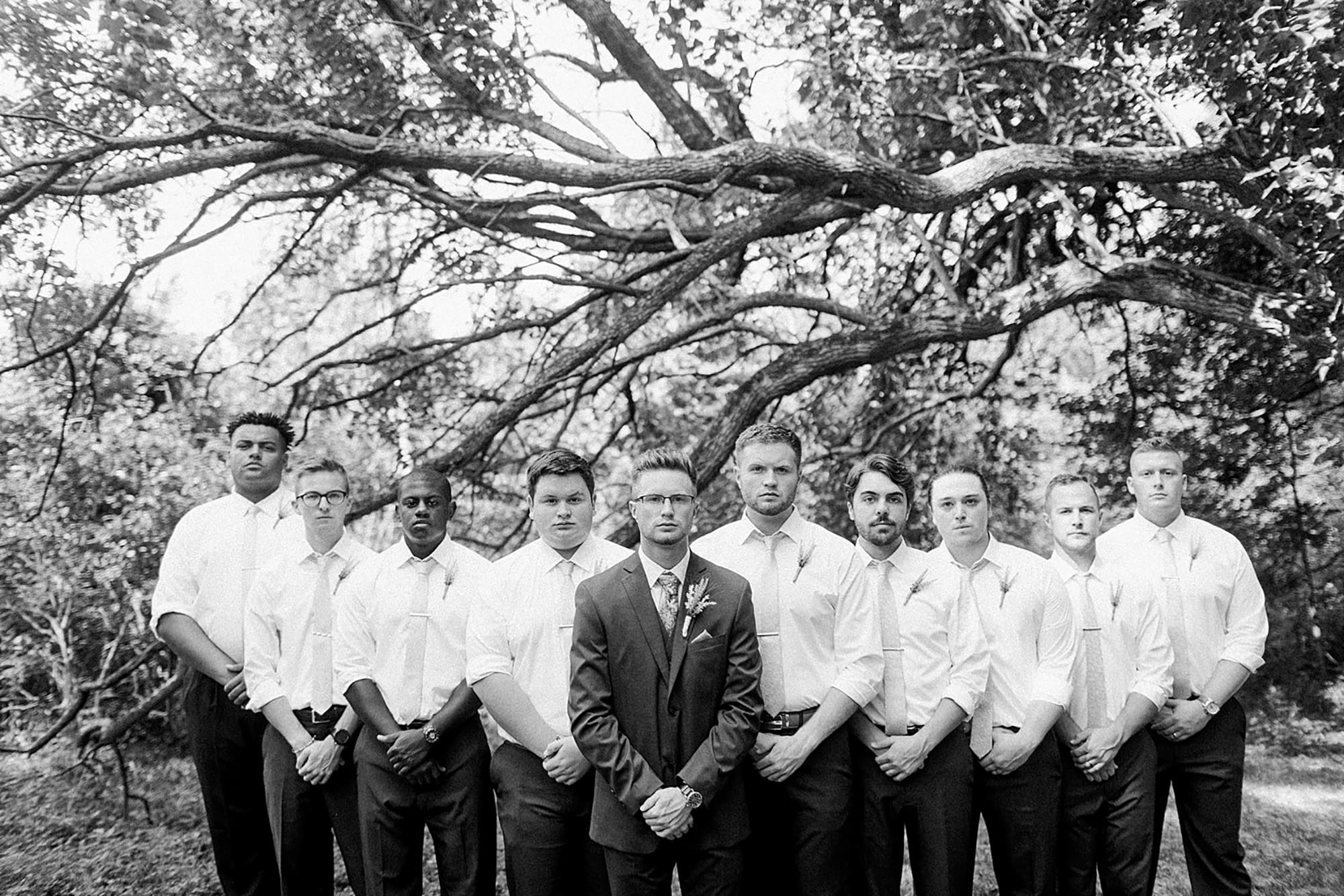 Arielle Peters Photography | Groom and groomsmen under willow tree on wedding day at Willowfield Lavender Farm in Mooresville, Indiana. 