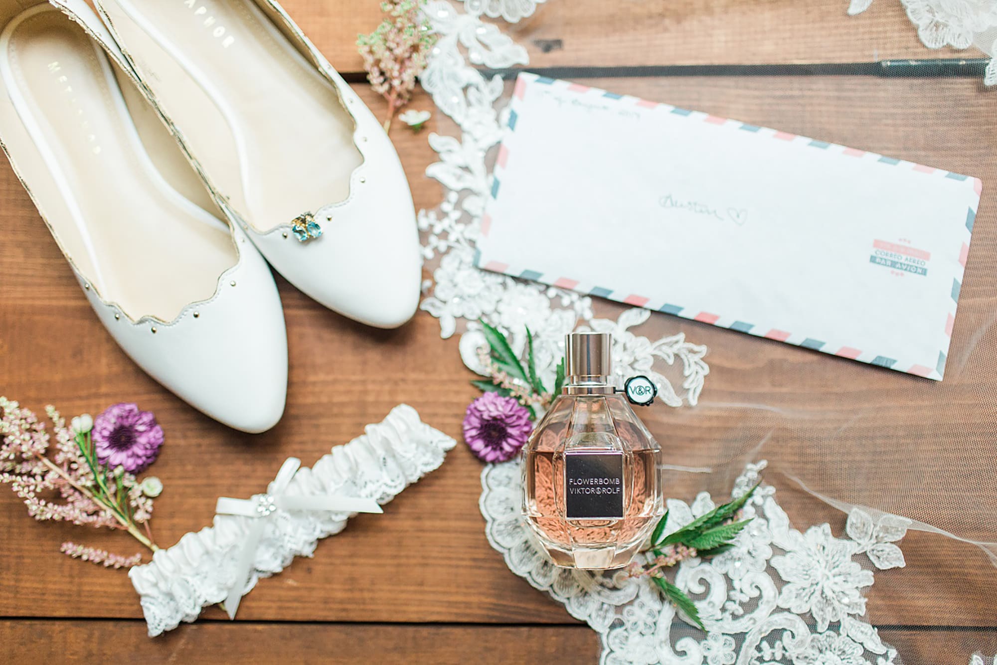Arielle Peters Photography | Wedding shoes and perfume on wooden background on wedding day at Willowfield Lavender Farm in Mooresville, Indiana. 