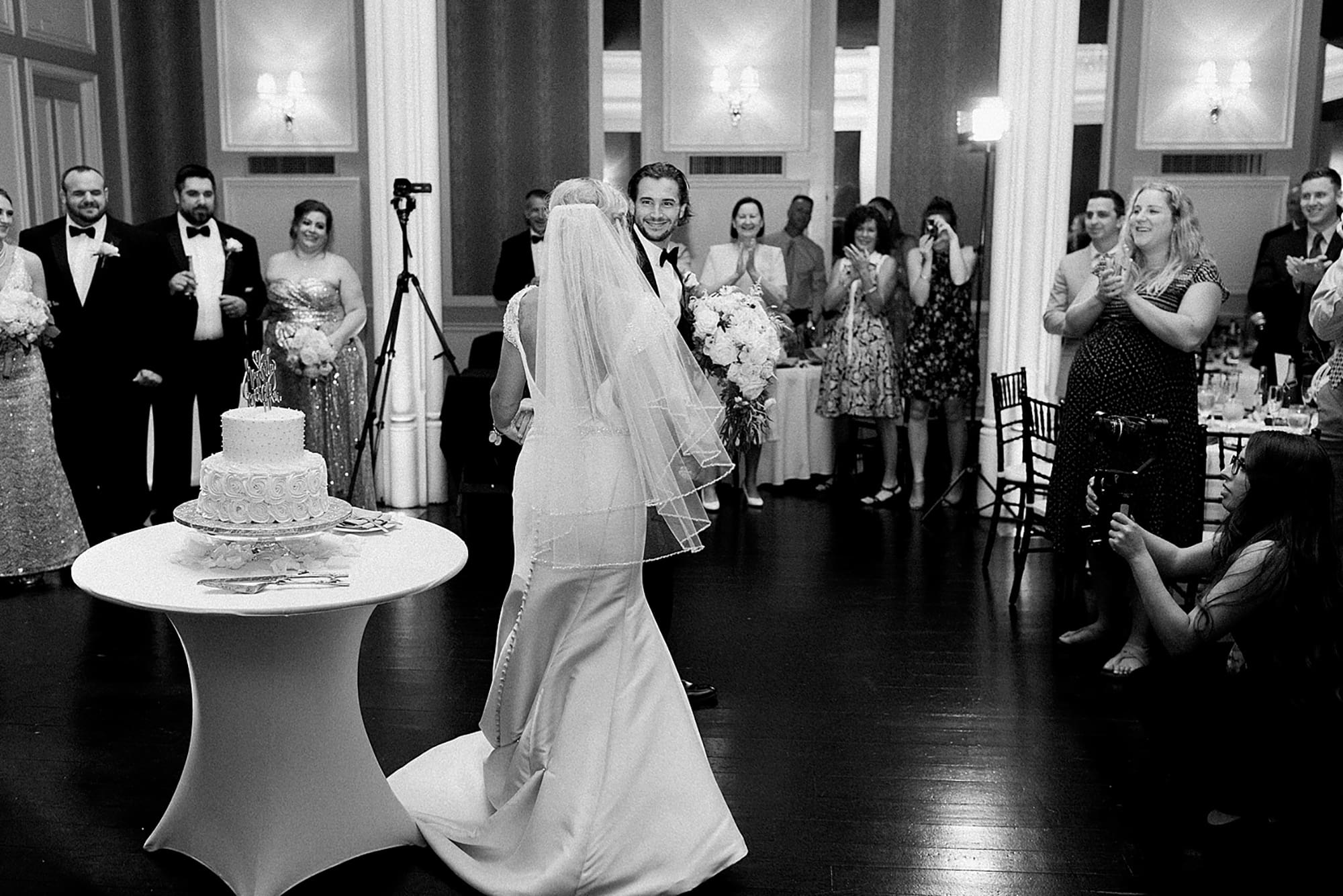 Arielle Peters Photography | Bride and groom entering wedding reception on wedding day at the Uptown Center in Michigan City, Indiana.