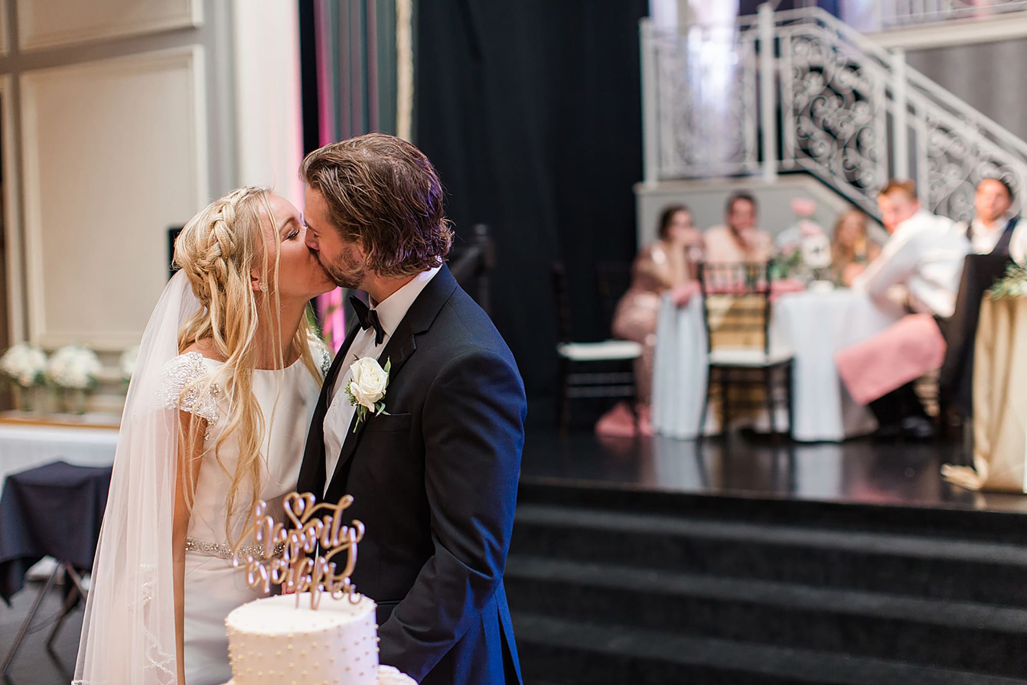 Arielle Peters Photography | Bride and groom kissing at wedding reception on wedding day at the Uptown Center in Michigan City, Indiana.