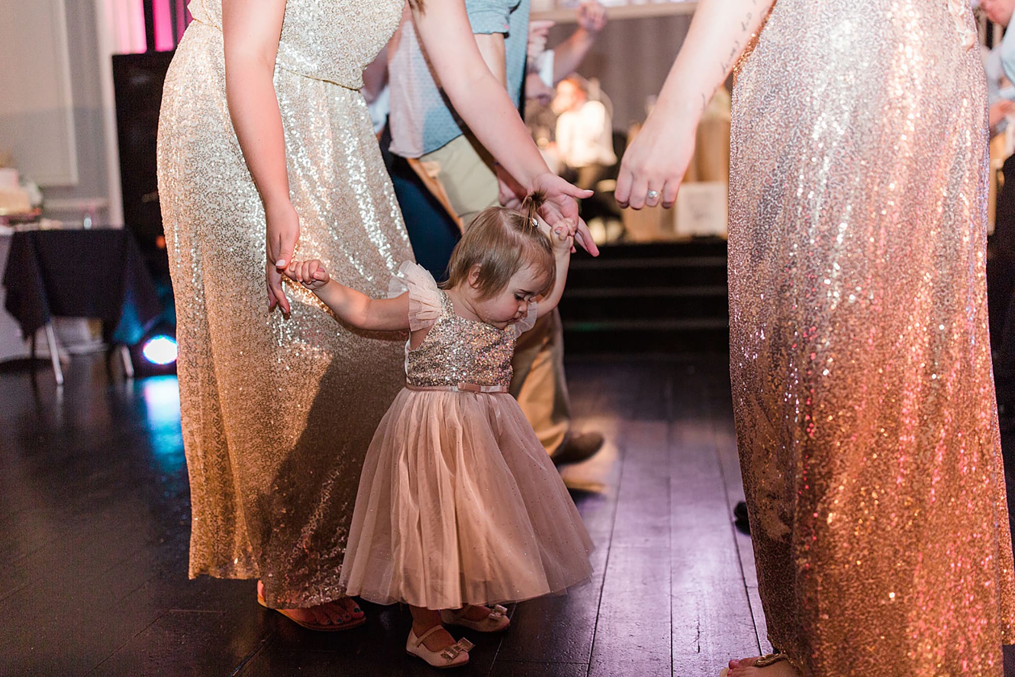 Arielle Peters Photography | Wedding guests dancing at wedding reception on wedding day at the Uptown Center in Michigan City, Indiana.