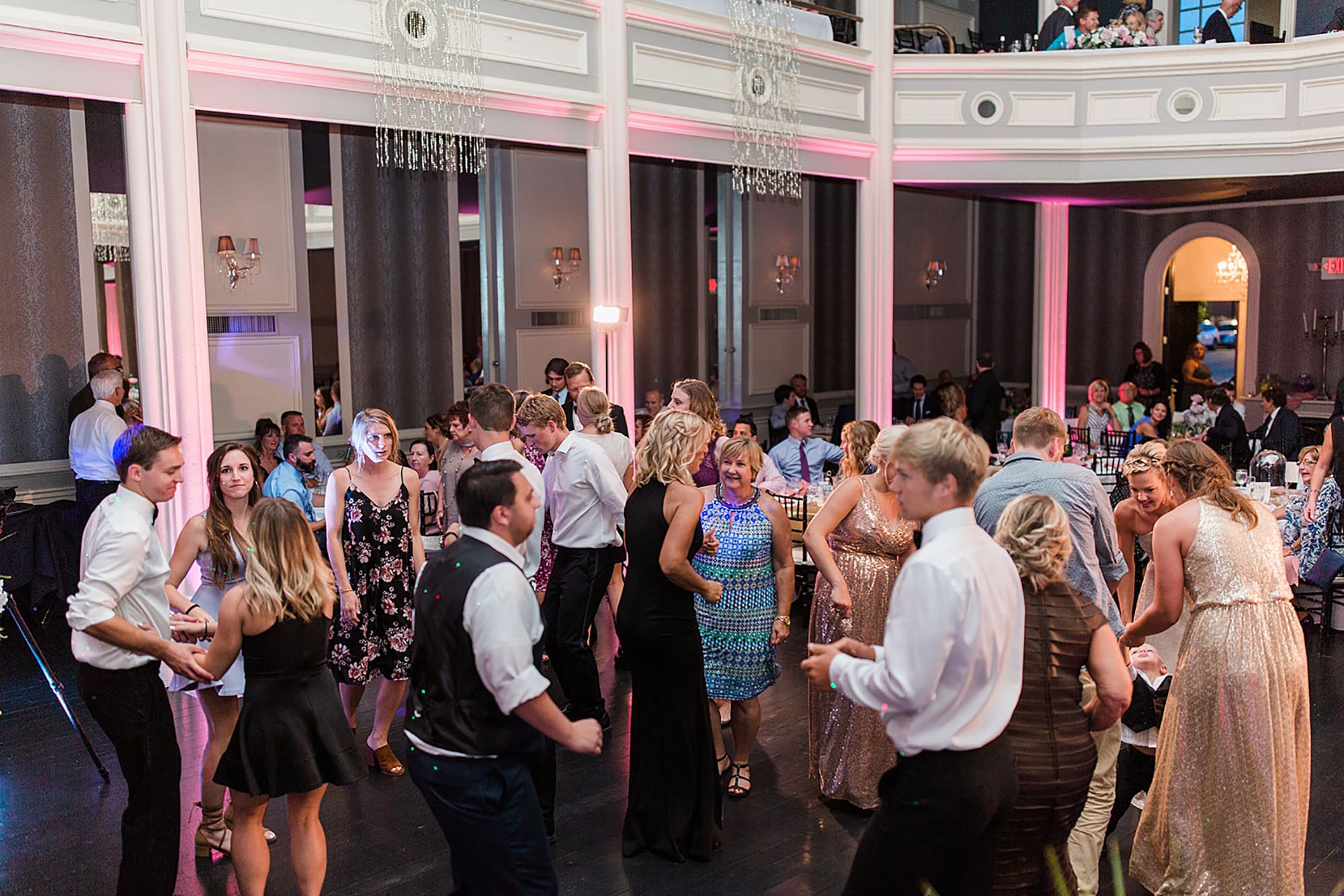 Arielle Peters Photography | Wedding guests dancing at wedding reception on wedding day at the Uptown Center in Michigan City, Indiana.