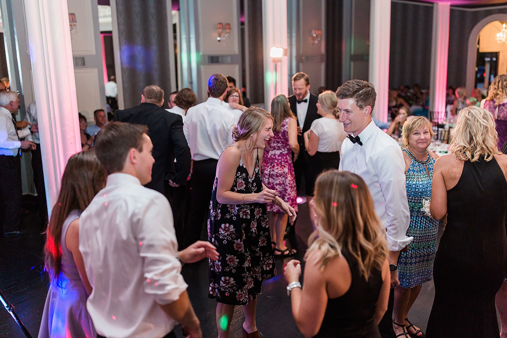 Arielle Peters Photography | Wedding guests dancing at wedding reception on wedding day at the Uptown Center in Michigan City, Indiana.