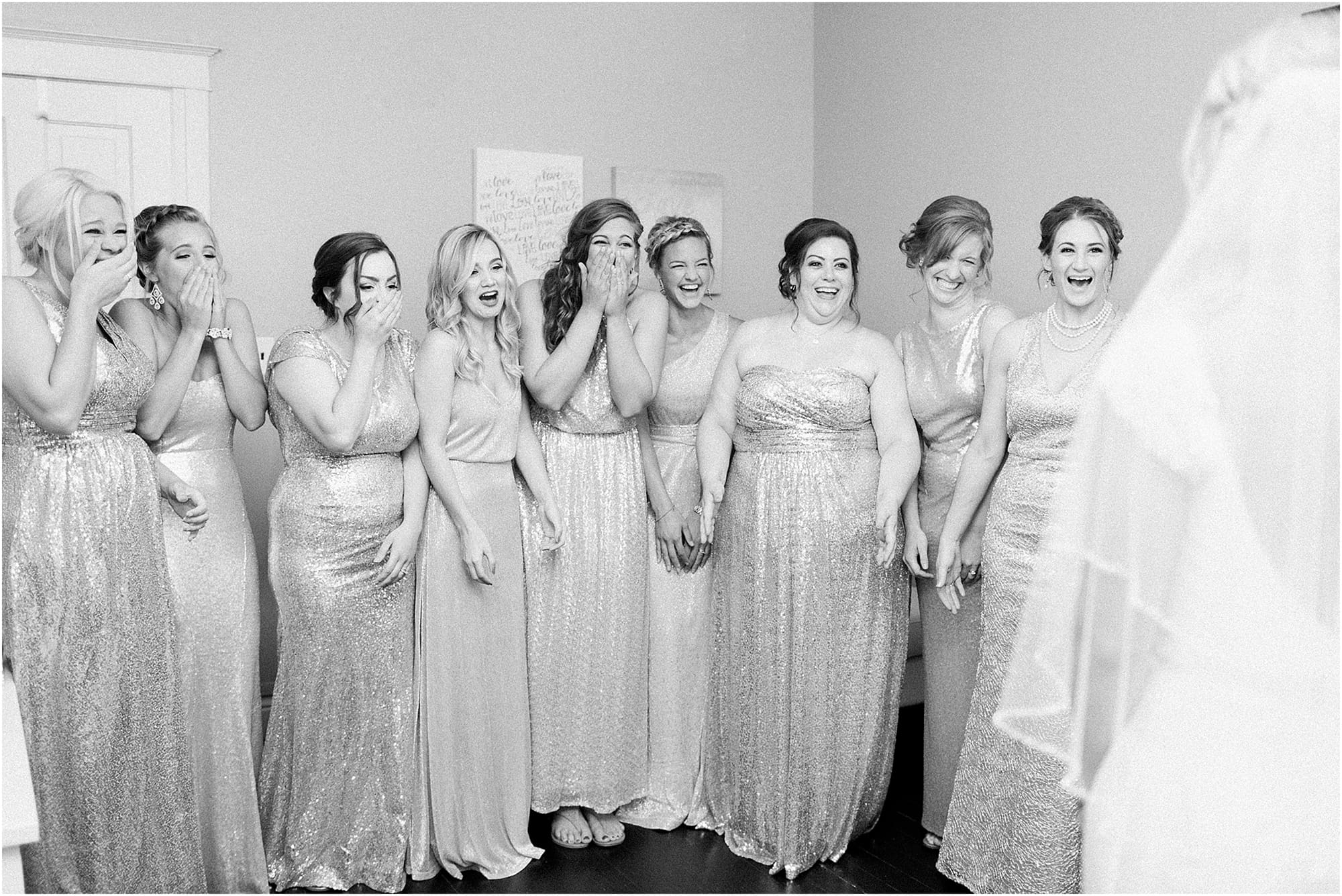 Arielle Peters Photography | Bride and bridesmaids having first reveal on wedding day at the Uptown Center in Michigan City, Indiana.