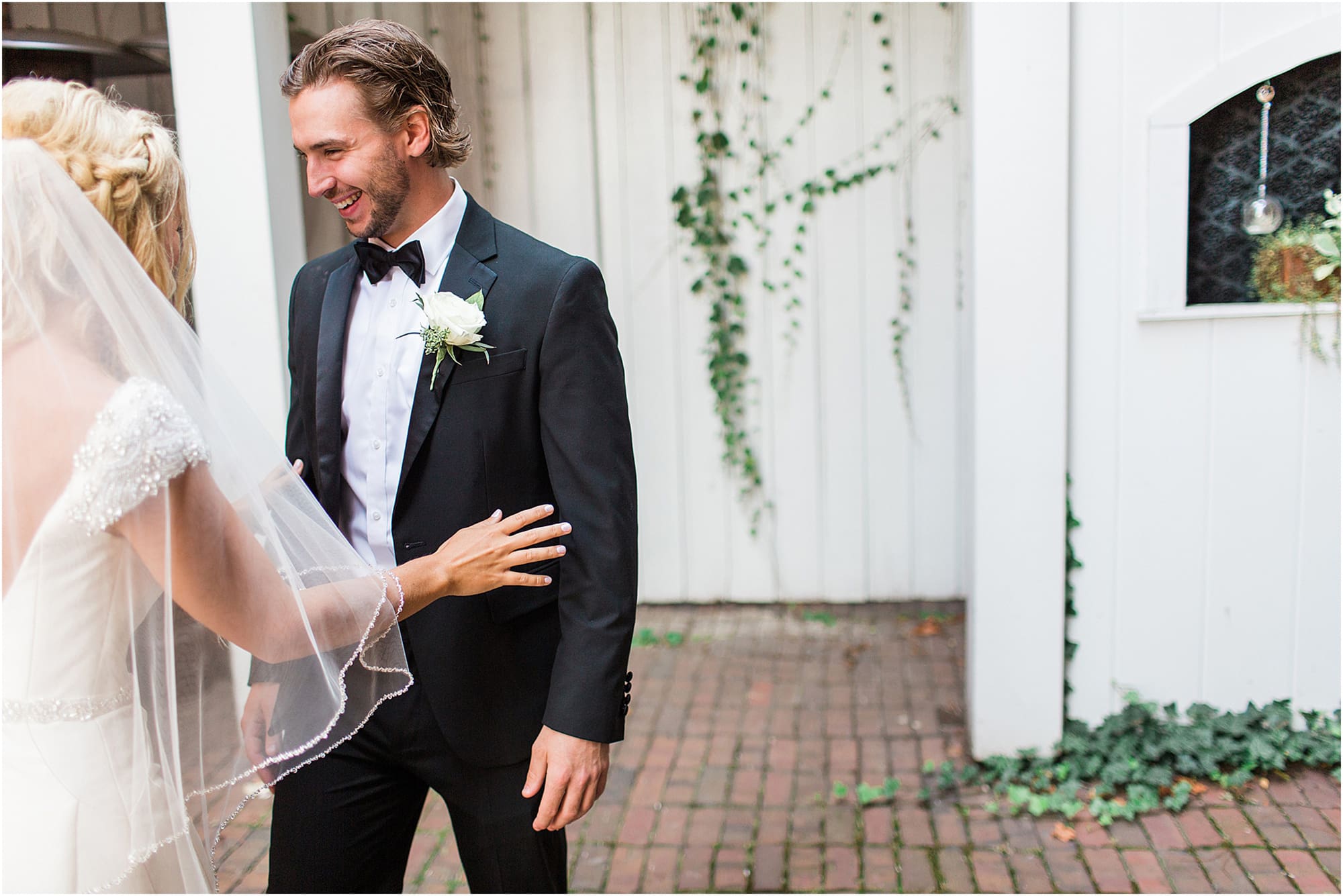 Arielle Peters Photography | Bride and groom having first reveal on wedding day at the Uptown Center in Michigan City, Indiana.