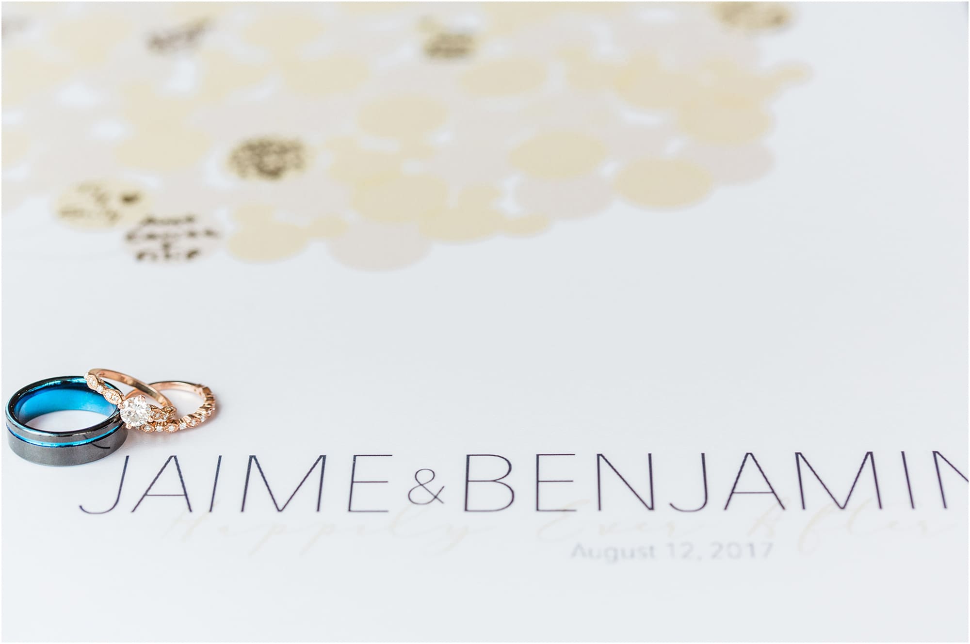 Arielle Peters Photography | Wedding rings on guest book on wedding day at the Uptown Center in Michigan City, Indiana.