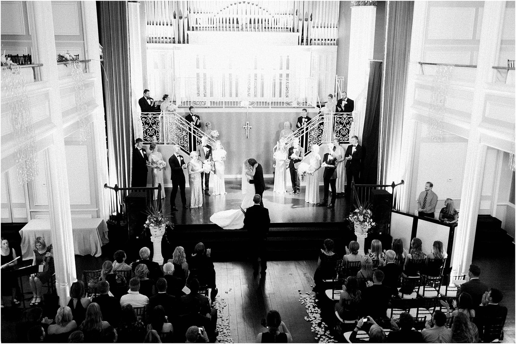 Arielle Peters Photography | Bride and groom kissing at the alter on wedding day at the Uptown Center in Michigan City, Indiana.
