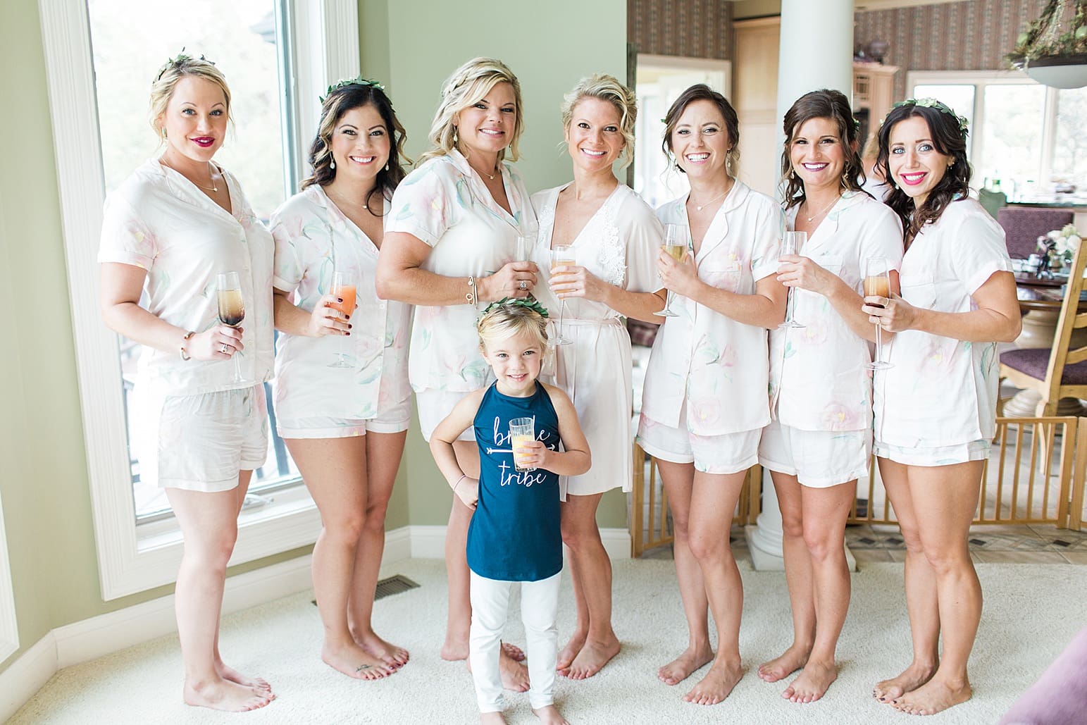 Arielle Peters Photography | Bride and bridesmaids getting ready in pajamas on wedding day at Joseph Decuis Farm in Roanoke, Indiana.