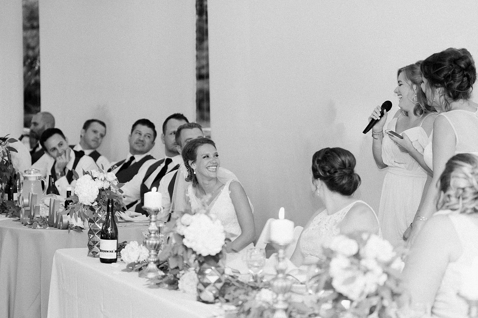 Arielle Peters Photography | Maid of honor giving speech at wedding reception on wedding day at The Pavilion at Sandy Pines in Demotte, Indiana.