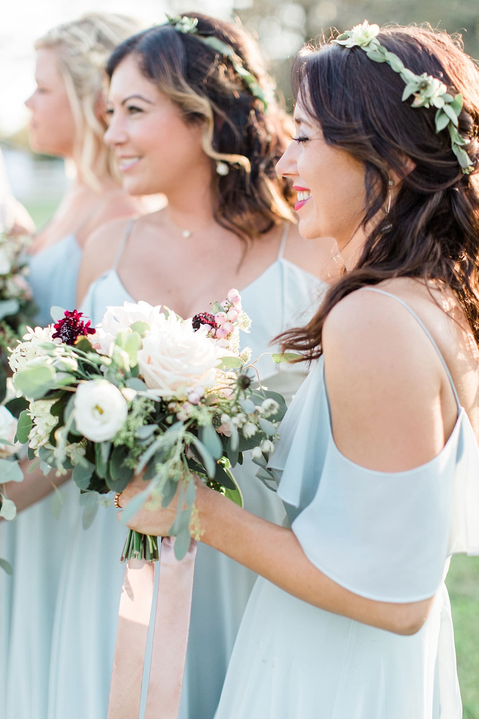 Arielle Peters Photography | Bridesmaids in open field next to pond on wedding day at Joseph Decuis Farm in Roanoke, Indiana.
