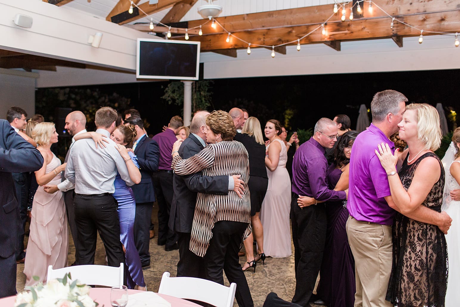 Arielle Peters Photography | Wedding guests dancing at wedding reception on wedding day at The Pavilion at Sandy Pines in Demotte, Indiana.
