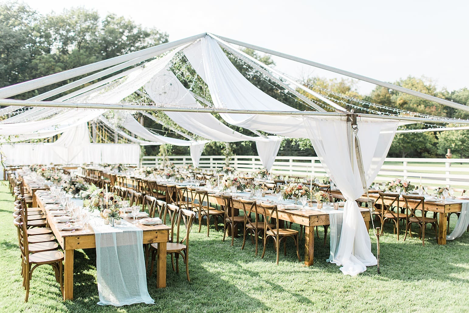 Arielle Peters Photography | Outdoor wedding reception table settings and floral arrangements on wedding day at Joseph Decuis Farm in Roanoke, Indiana.
