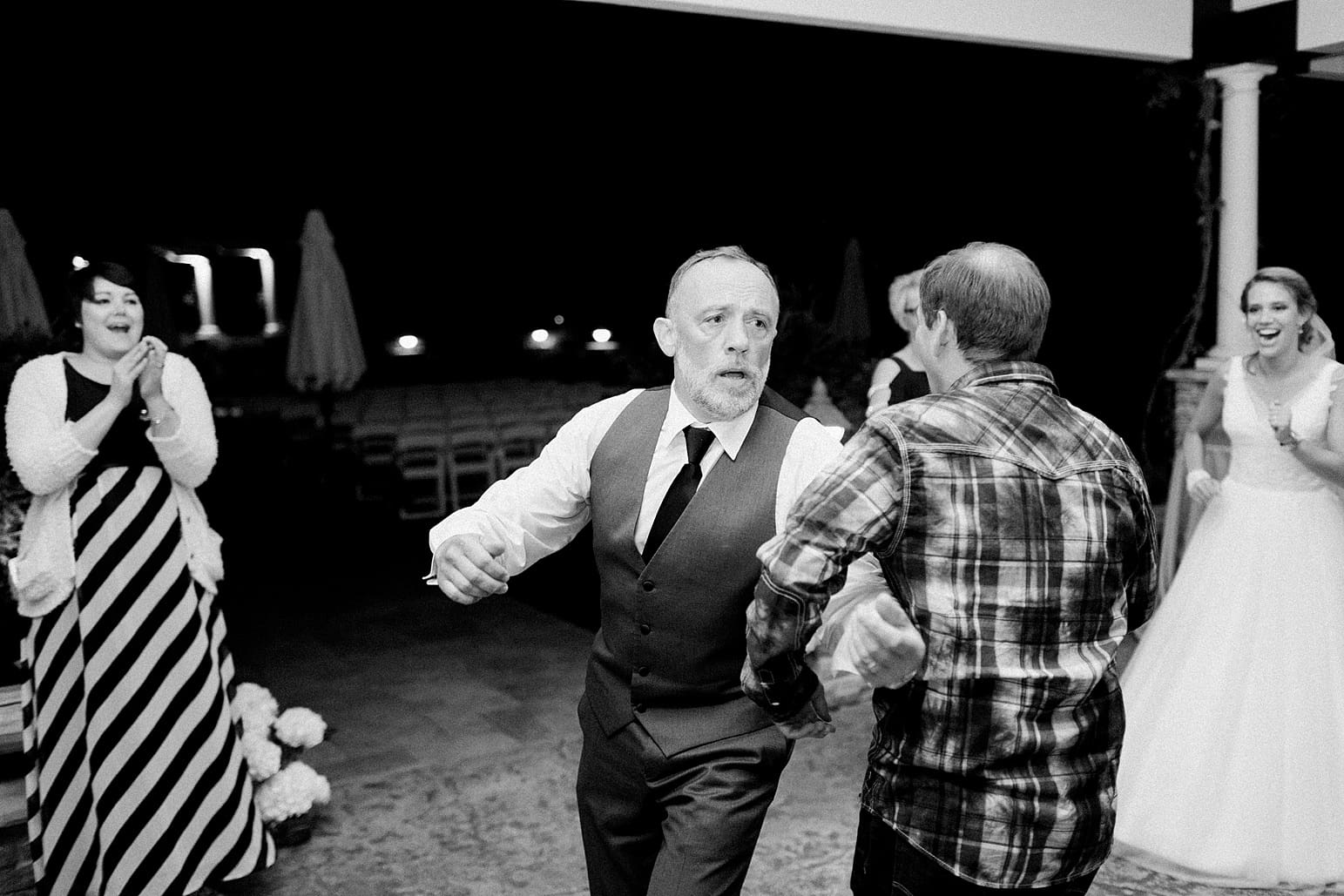 Arielle Peters Photography | Wedding guests dancing at wedding reception on wedding day at The Pavilion at Sandy Pines in Demotte, Indiana.