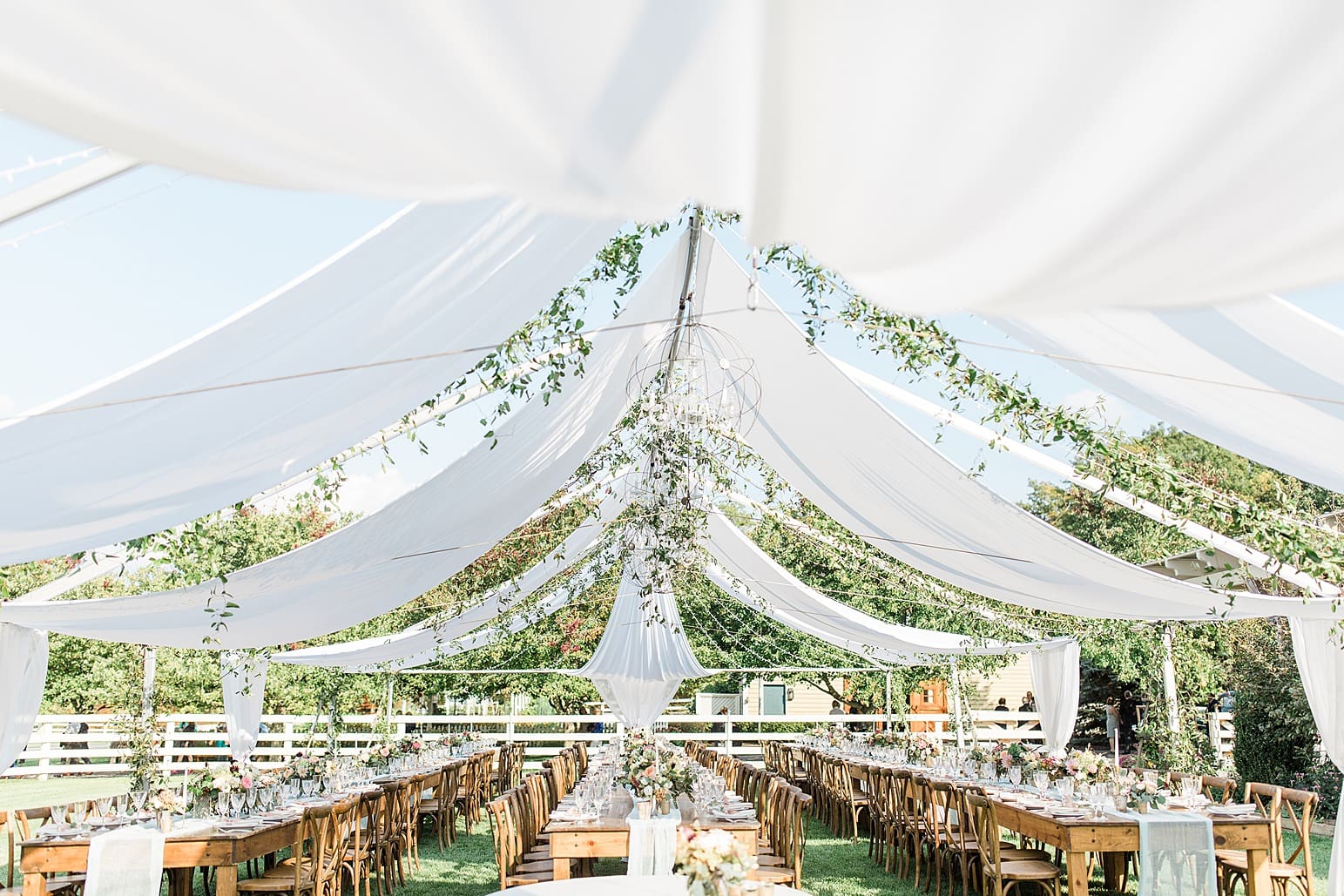 Arielle Peters Photography | Outdoor wedding reception table settings and floral arrangements on wedding day at Joseph Decuis Farm in Roanoke, Indiana.