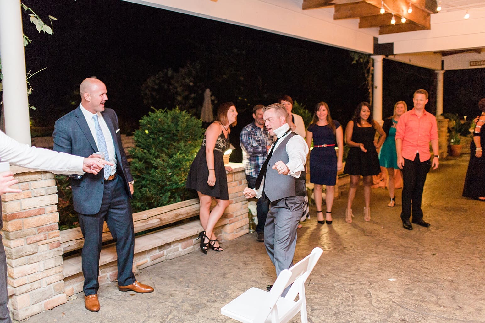 Arielle Peters Photography | Wedding guests dancing at wedding reception on wedding day at The Pavilion at Sandy Pines in Demotte, Indiana.