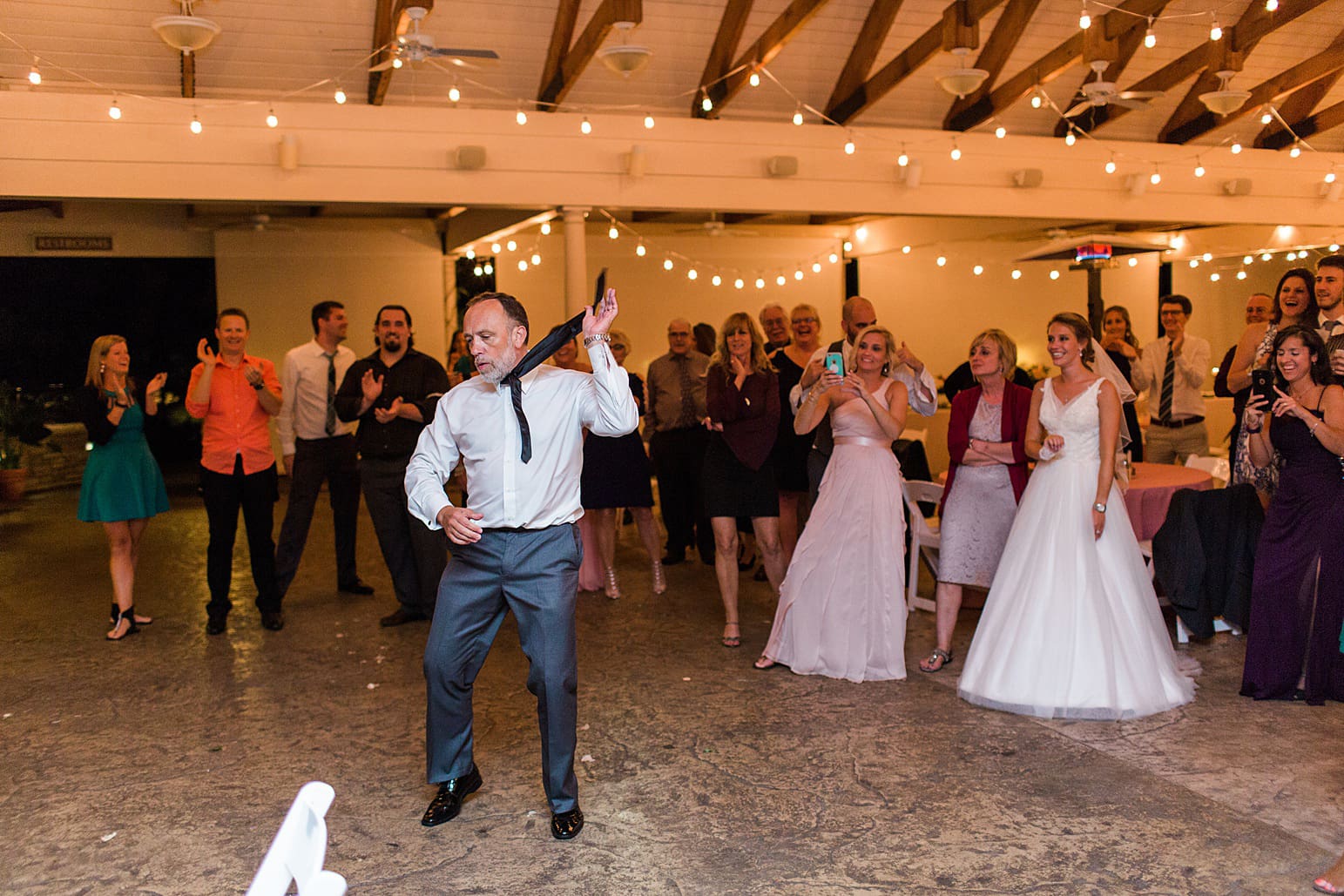 Arielle Peters Photography | Wedding guests dancing at wedding reception on wedding day at The Pavilion at Sandy Pines in Demotte, Indiana.