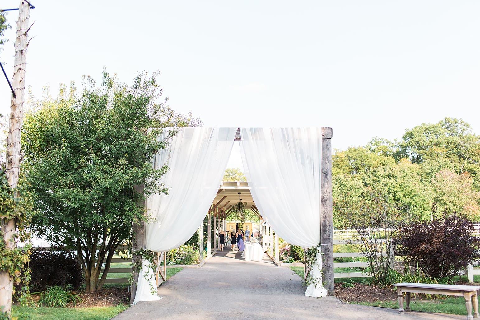 Arielle Peters Photography | Outdoor wedding reception table settings and floral arrangements on wedding day at Joseph Decuis Farm in Roanoke, Indiana.