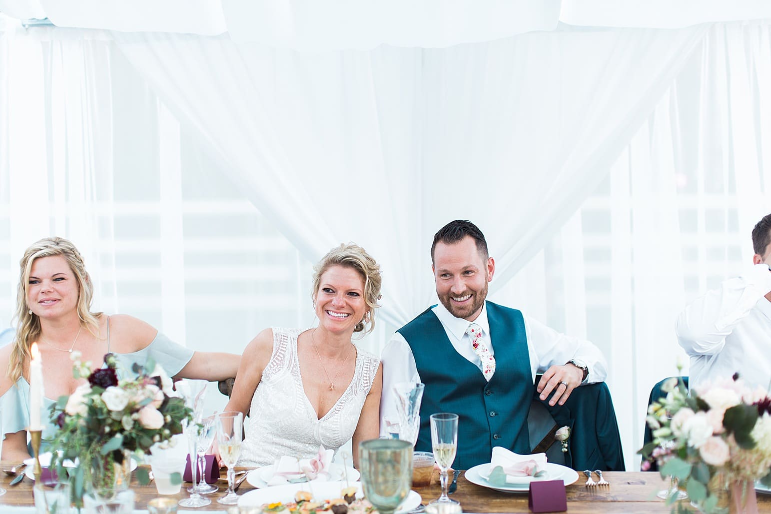 Arielle Peters Photography | Bride and groom laughing at wedding reception on wedding day at Joseph Decuis Farm in Roanoke, Indiana.