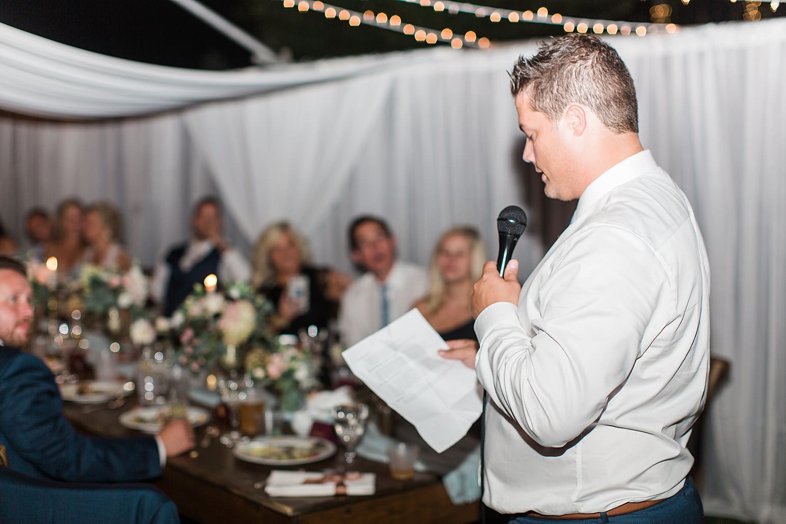 Arielle Peters Photography | Best man giving speech at outdoor wedding reception on wedding day at Joseph Decuis Farm in Roanoke, Indiana.