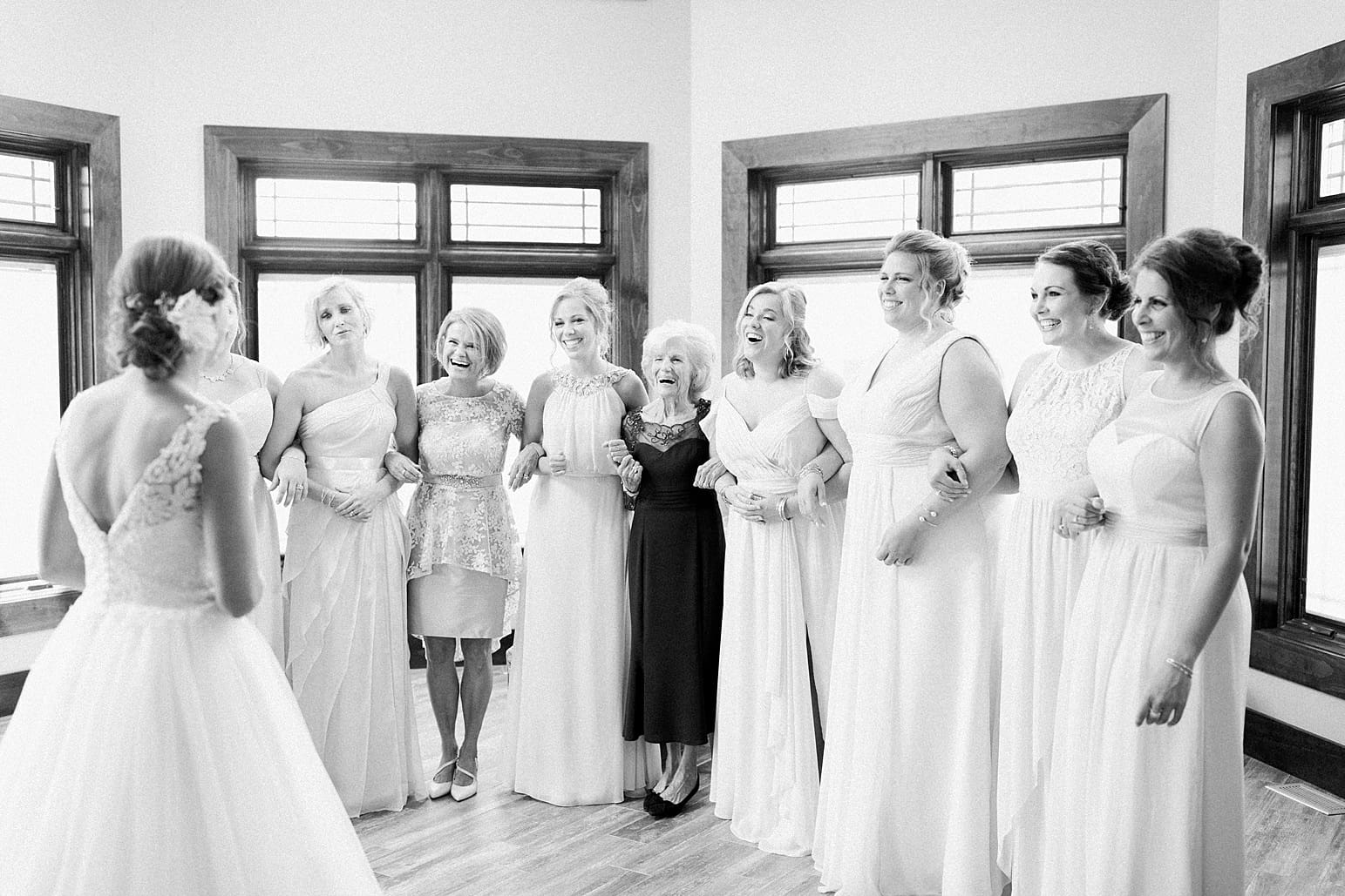 Arielle Peters Photography | Bride and bridesmaids having first reveal on wedding day at The Pavilion at Sandy Pines in Demotte, Indiana.
