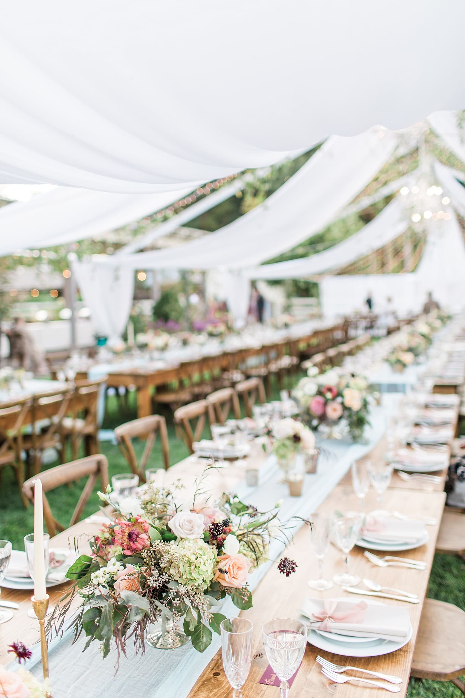 Arielle Peters Photography | Outdoor wedding reception table settings and floral arrangements on wedding day at Joseph Decuis Farm in Roanoke, Indiana.