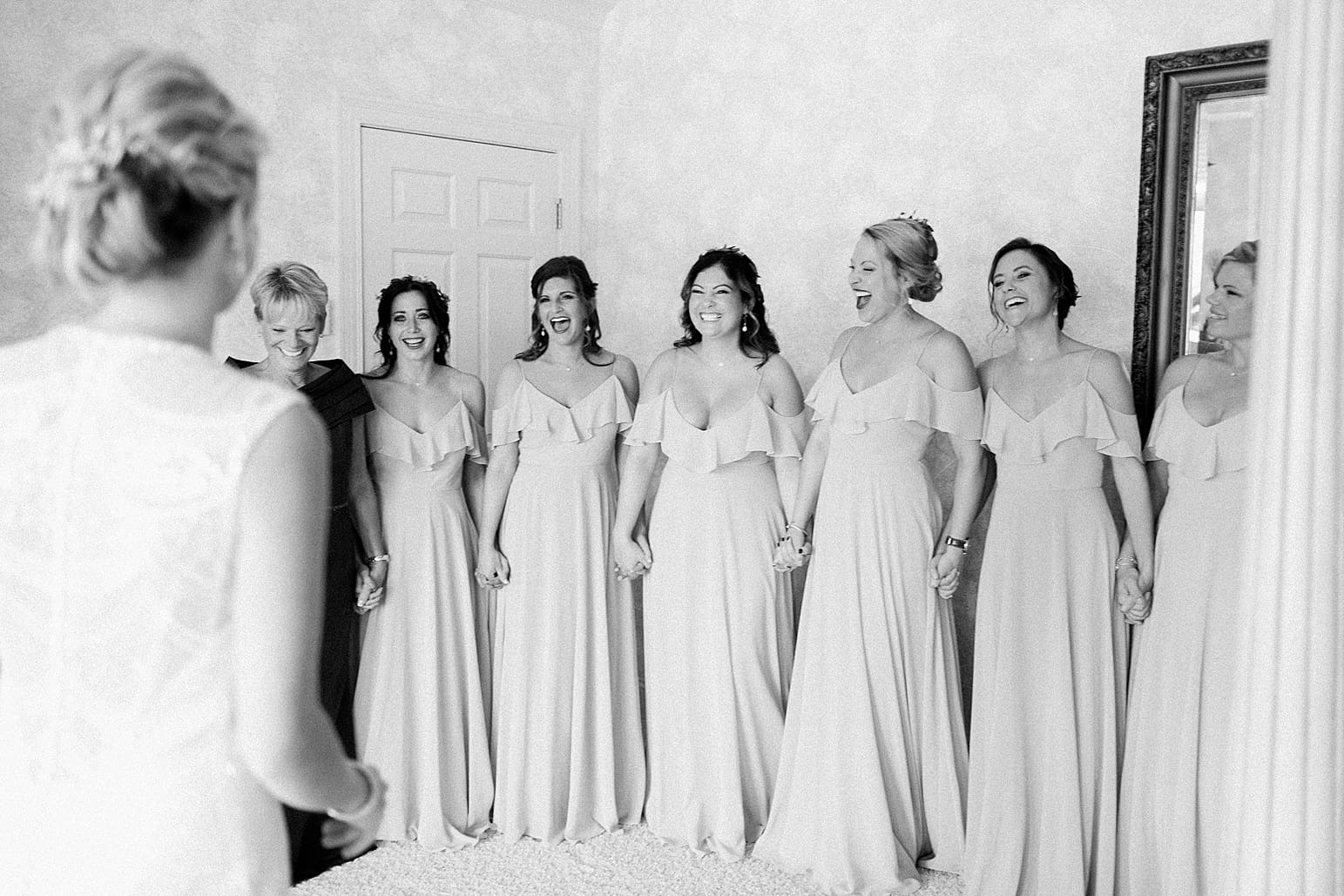Arielle Peters Photography | Bride and bridesmaids having first reveal on wedding day at Joseph Decuis Farm in Roanoke, Indiana.