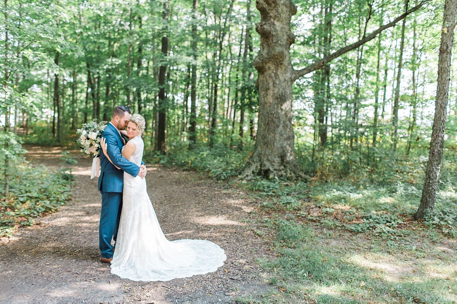 Arielle Peters Photography | Bride and groom in the woods on wedding day at Joseph Decuis Farm in Roanoke, Indiana.