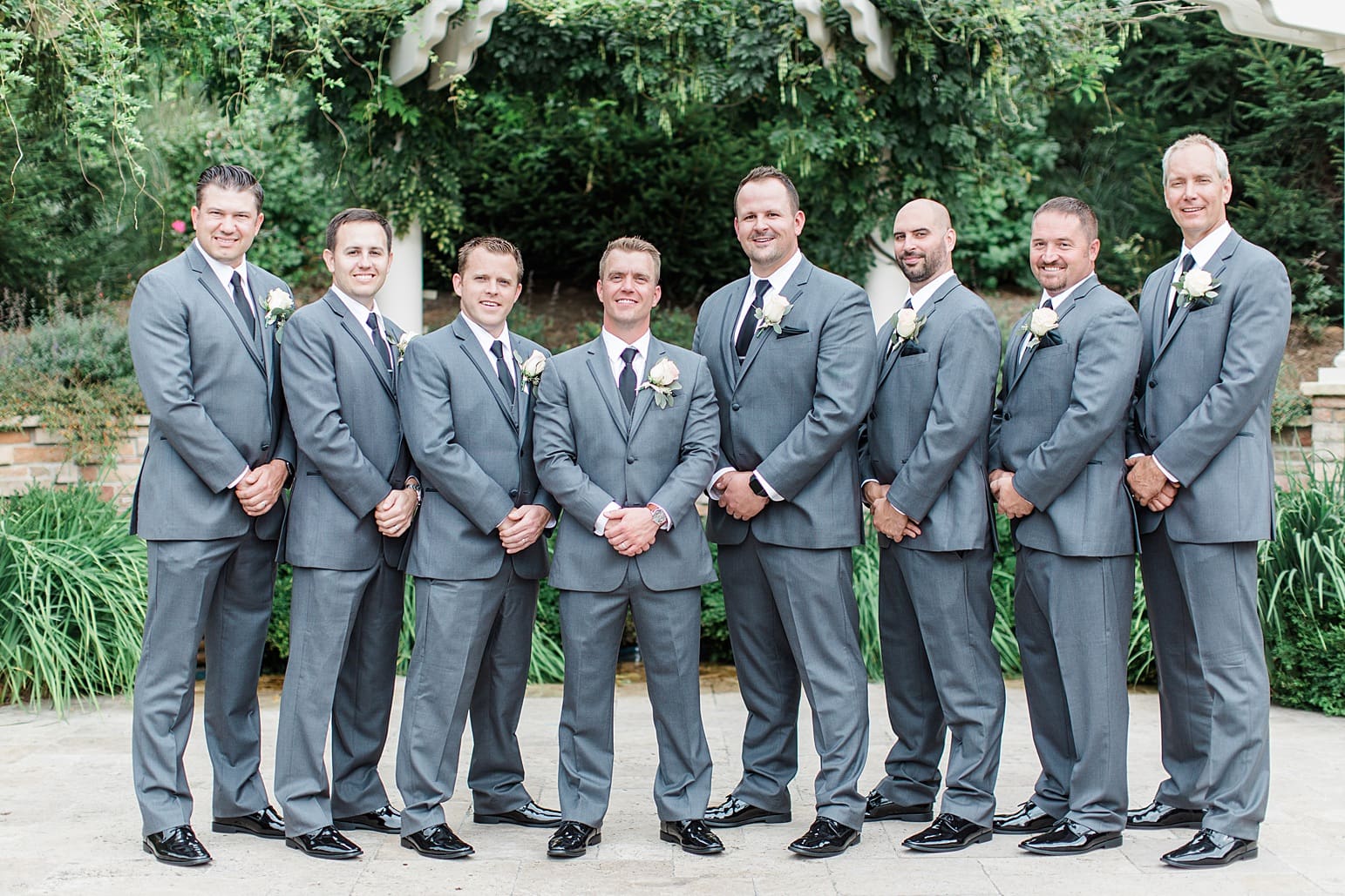 Arielle Peters Photography | Groom and groomsmen outside on wedding day at The Pavilion at Sandy Pines in Demotte, Indiana.