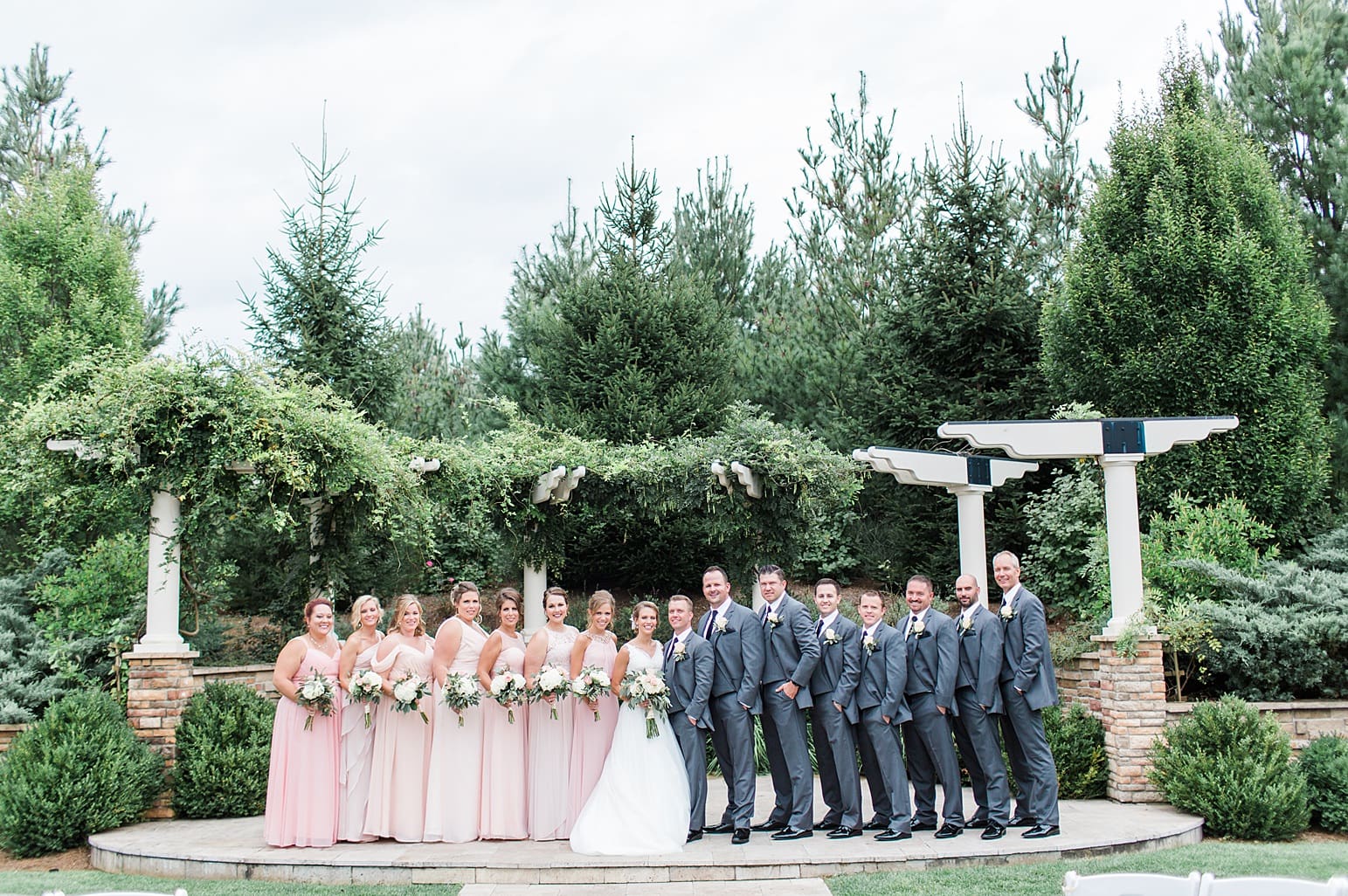 Arielle Peters Photography | Wedding party under pavilion on wedding day at The Pavilion at Sandy Pines in Demotte, Indiana.